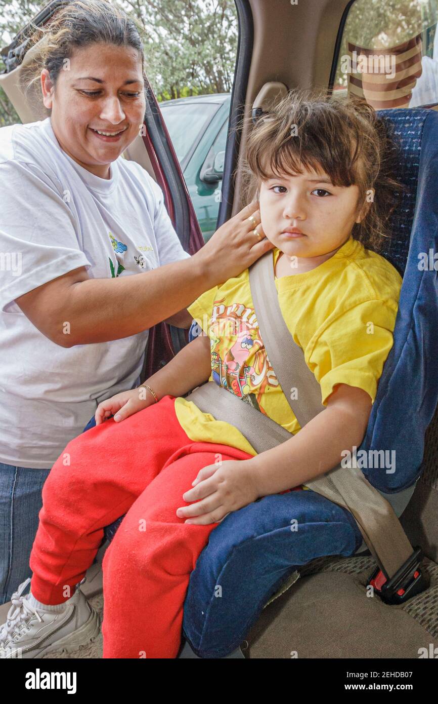 Miami Beach Florida,Police Department child car seat giveaway,Hispanic