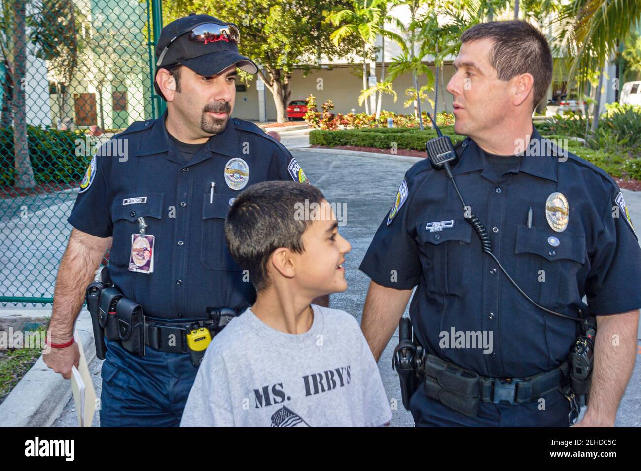 North Miami Beach Florida,Police Department,policeman policemen Hispanic boy child, Stock Photo