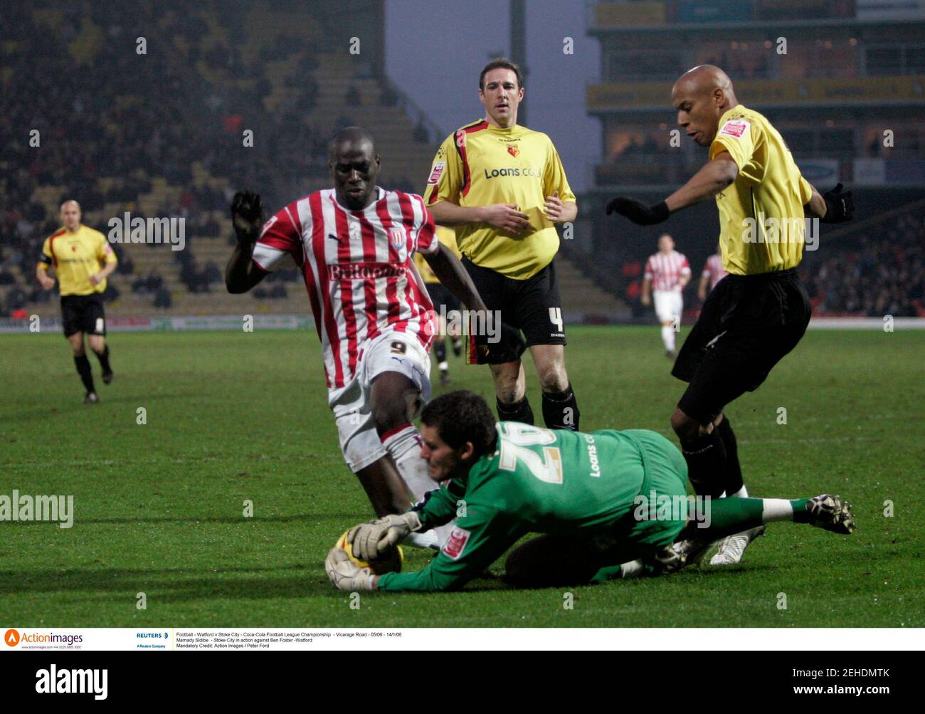 Football - Watford v Stoke City - Coca-Cola Football League Championship -  Vicarage Road - 05/06 - 14/1/06 Mamady Sidibe - Stoke City in action  against Ben Foster -Watford Mandatory Credit: Action Images / Peter Ford  Stock Photo - Alamy