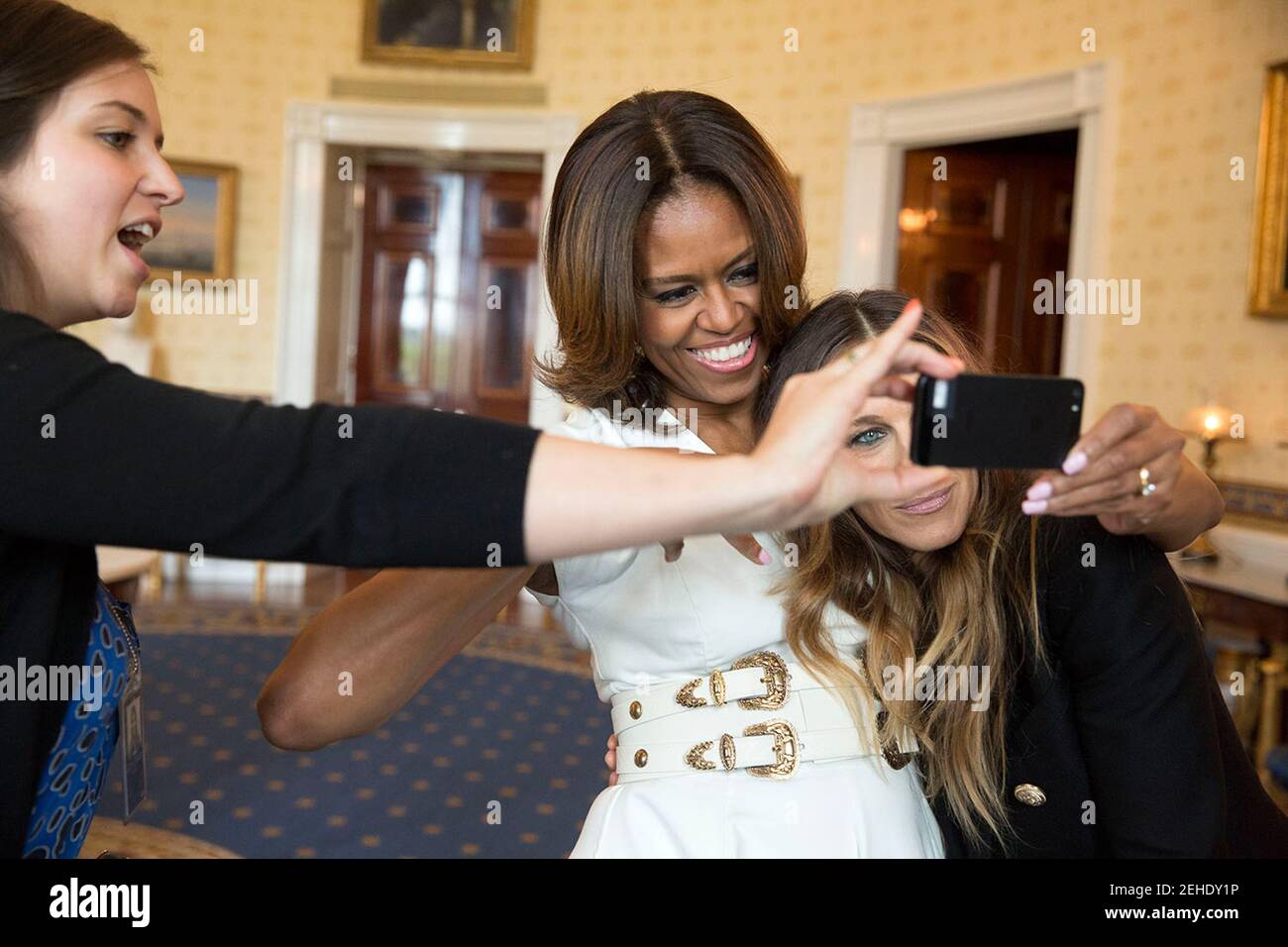 First Lady Michelle Obama and Sarah Jessica Parker pose for a selfie in the Blue Room prior to the White House Talent Show hosted with the President s Committee on the Arts and
