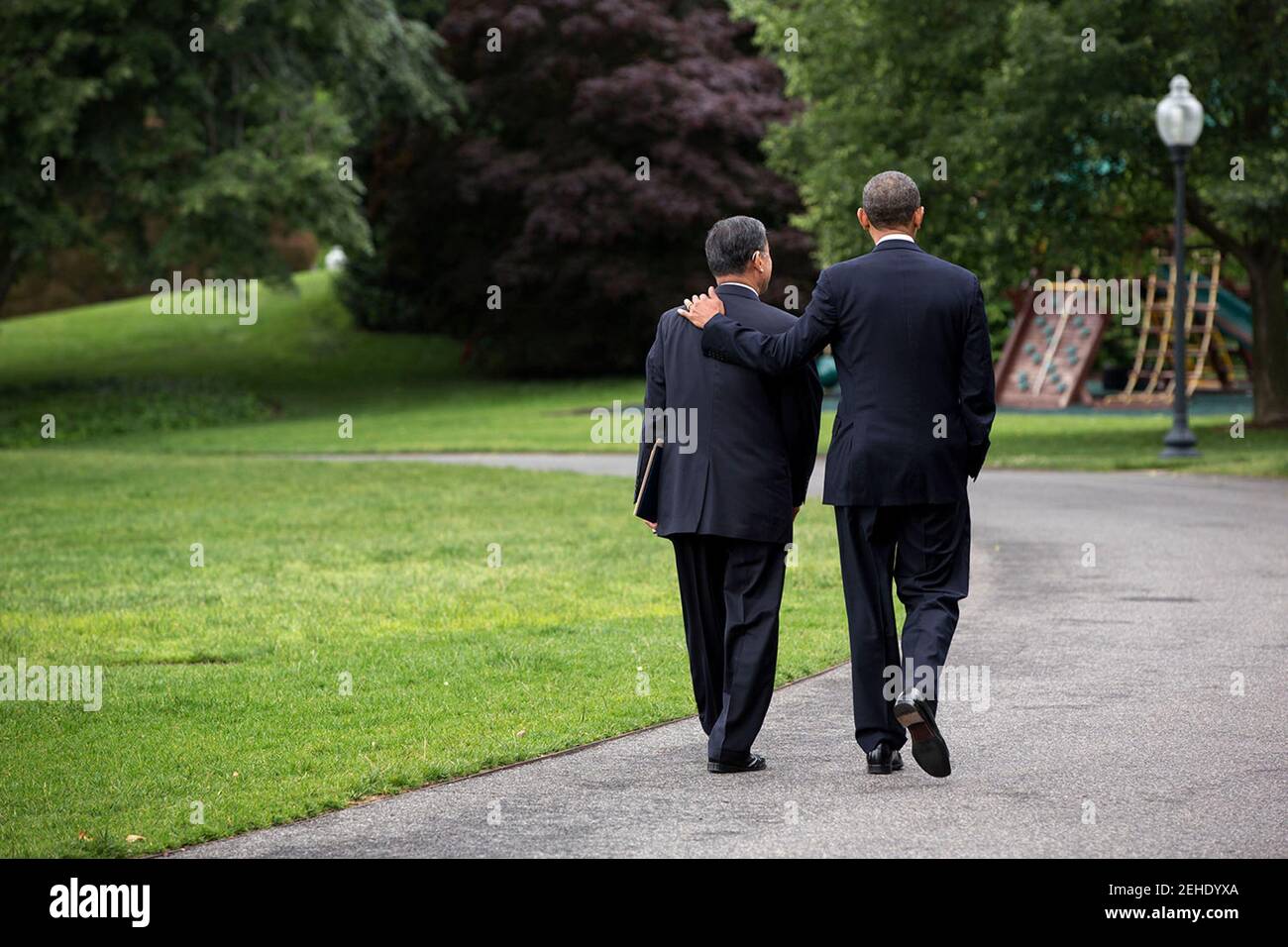 President Barack Obama walks with Veterans Affairs Secretary Eric K. Shinseki along the South Driveway of the White House, May 30, 2014. The President accepted Shinseki's resignation and named Sloan D. Gibson, United States Deputy Secretary of Veterans Affairs as Acting Secretary of Veterans Affairs. Stock Photo
