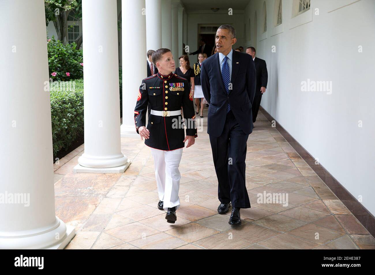 President Barack Obama walks on the Colonnade with Corporal William 'Kyle' Carpenter, U.S. Marine Corps (Ret.) en route to a Medal of Honor ceremony in the East Room of the White House, June 19, 2014. Stock Photo