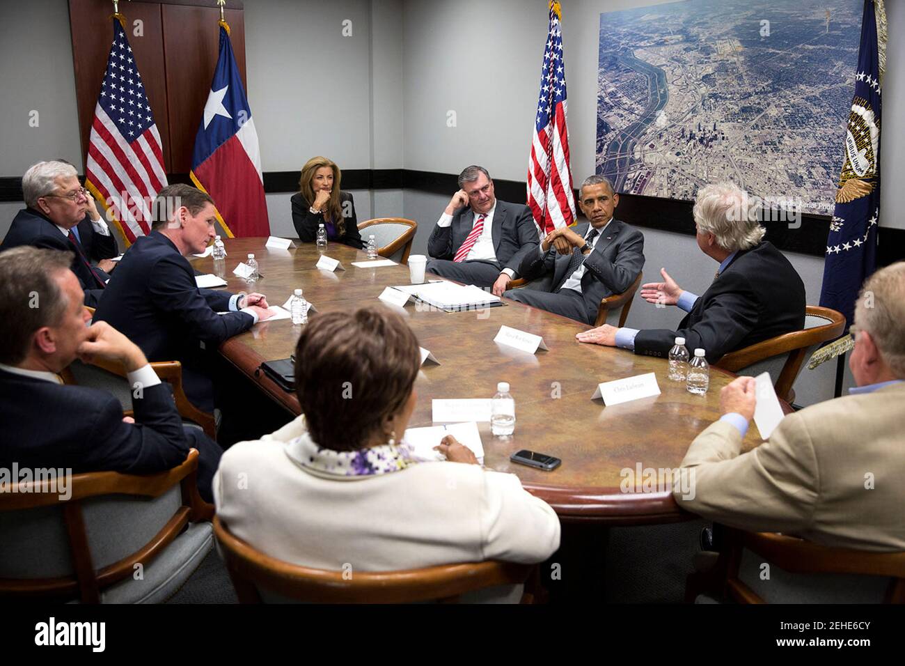 President Barack Obama meets with local elected officials and faith leaders to discuss immigration, at the Dalfort Fueling Building at Dallas Love Field in Dallas, Texas, July 9, 2014. Stock Photo
