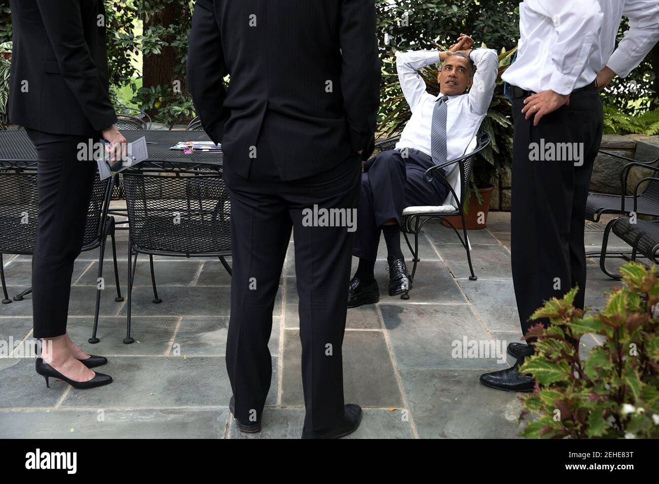 President Barack Obama talks with Chief of Staff Denis McDonough, right ...