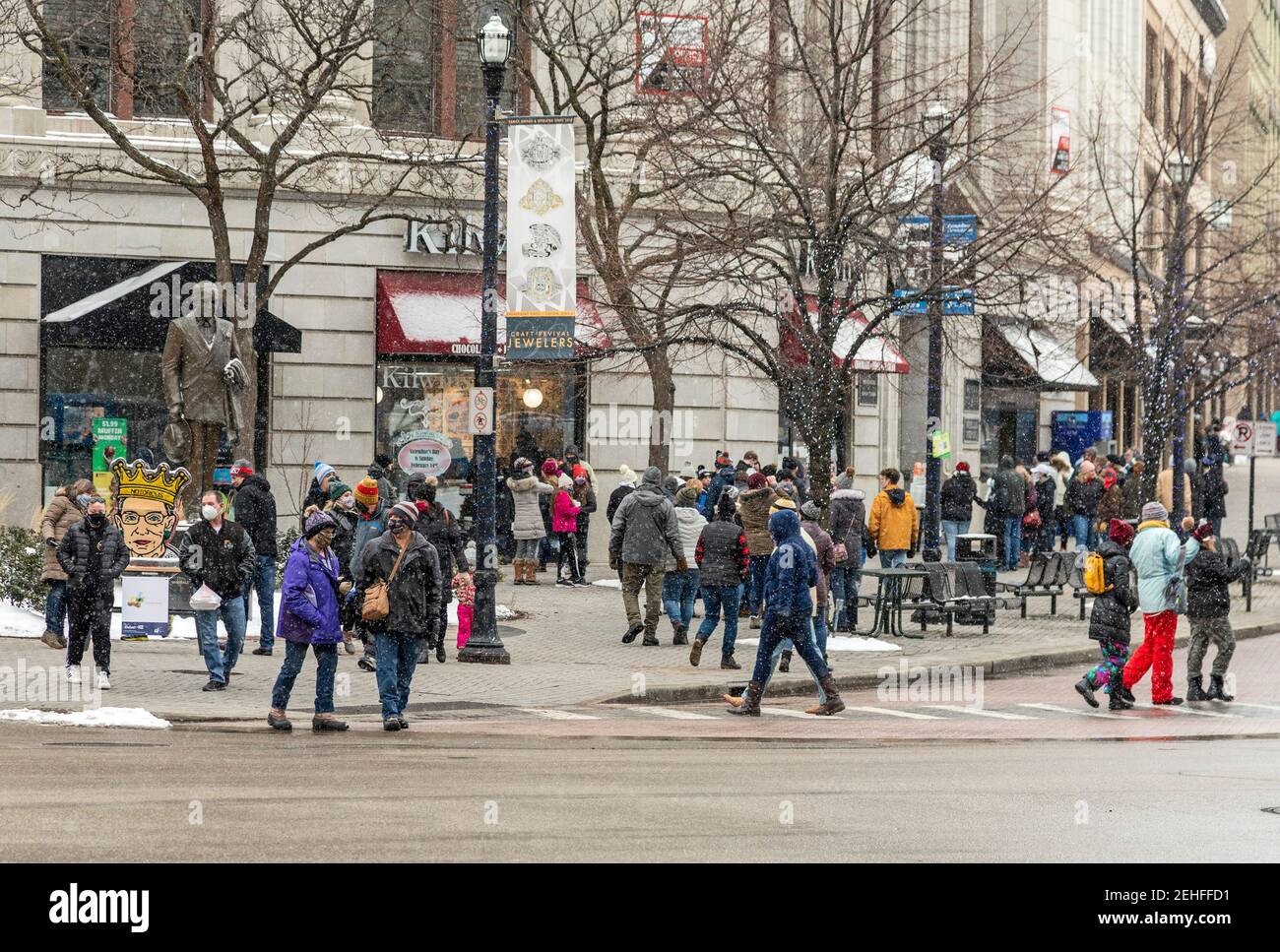 Grand Rapids, Michigan - Winter crowds on downtown streets during the coronavirus pandemic. Stock Photo