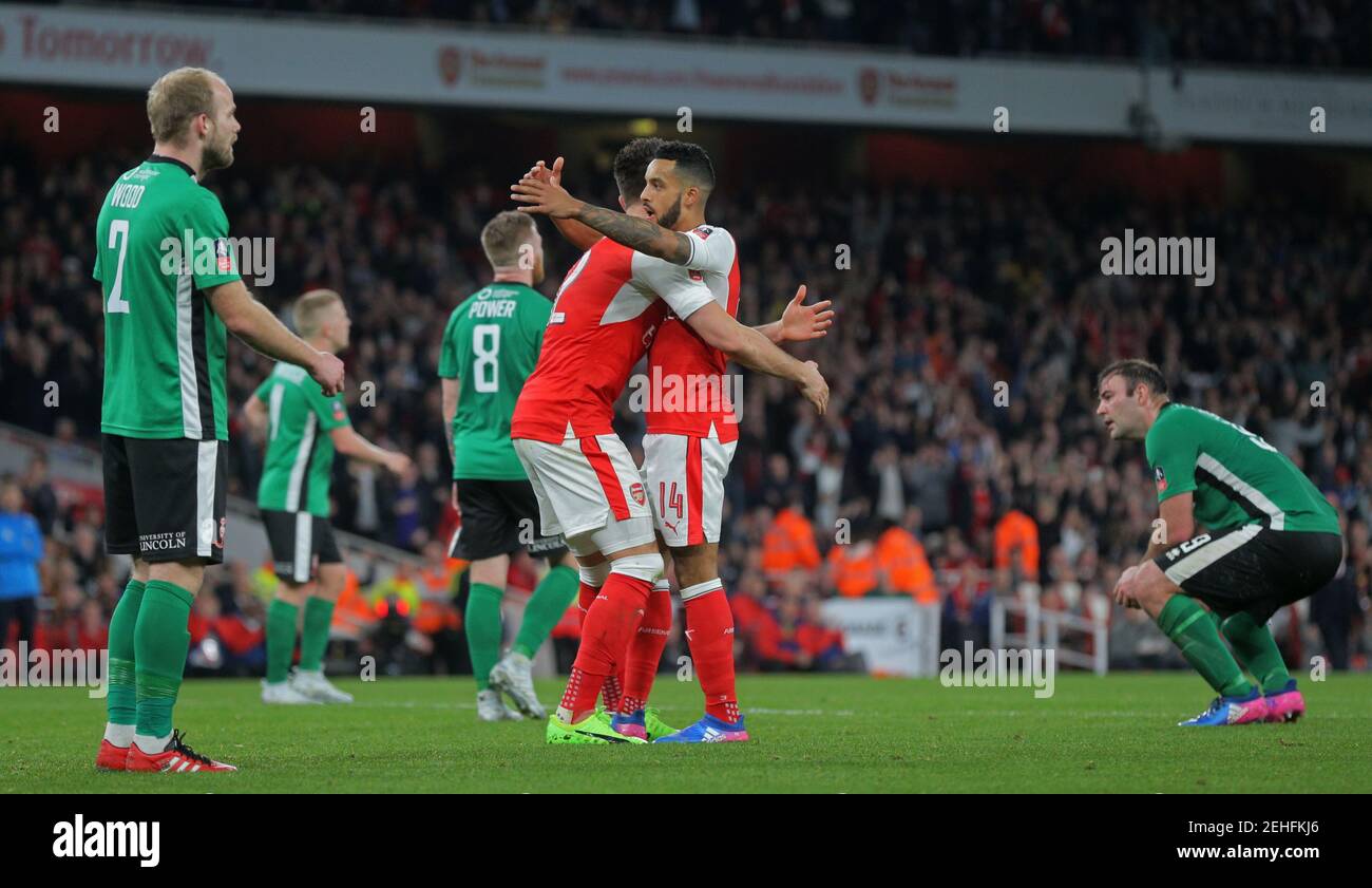 Britain Football Soccer - Arsenal v Lincoln City - FA Cup Quarter Final - The Emirates Stadium - 11/3/17 Arsenal's Theo Walcott celebrates scoring their first goal with Olivier Giroud  Reuters / Paul Hackett Livepic EDITORIAL USE ONLY. No use with unauthorized audio, video, data, fixture lists, club/league logos or 'live' services. Online in-match use limited to 45 images, no video emulation. No use in betting, games or single club/league/player publications.  Please contact your account representative for further details. Stock Photo