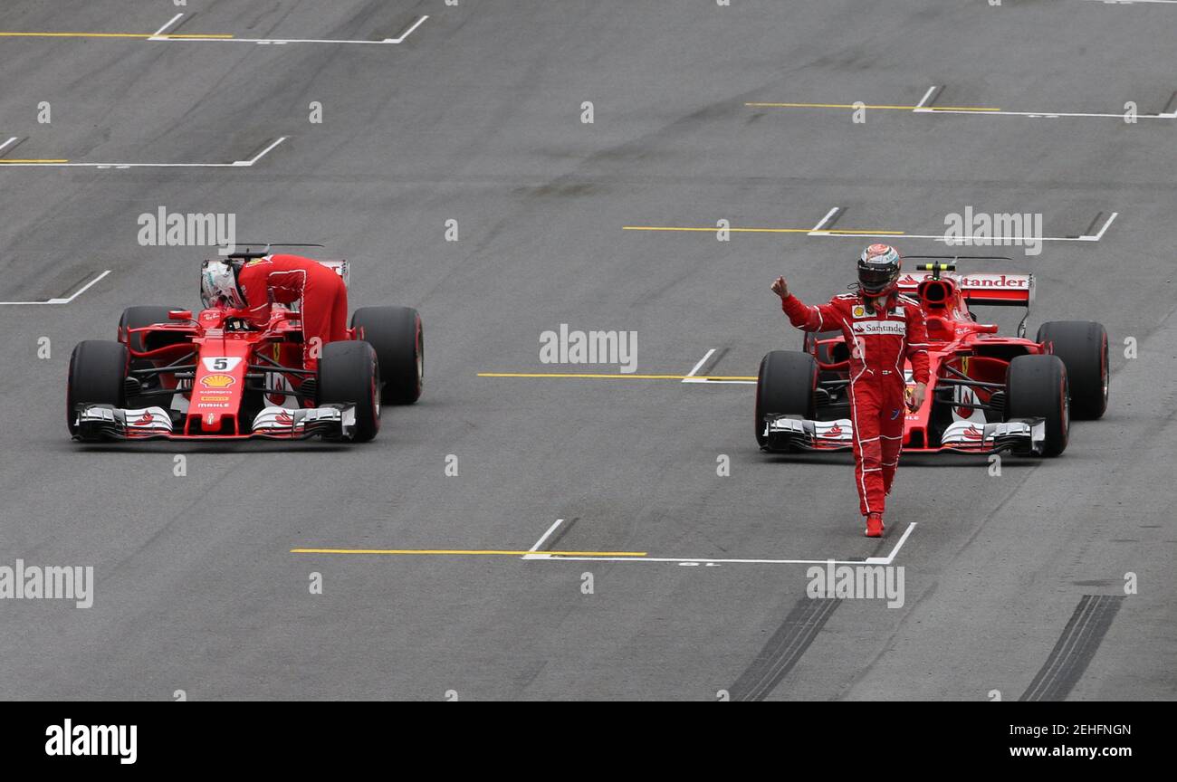 Formula One F1 - Brazilian Grand Prix 2017 - Sao Paulo, Brazil - November 11, 2017  Ferrari's Kimi Raikkonen and Sebastian Vettel after qualifying  REUTERS/Paulo Whitaker Stock Photo