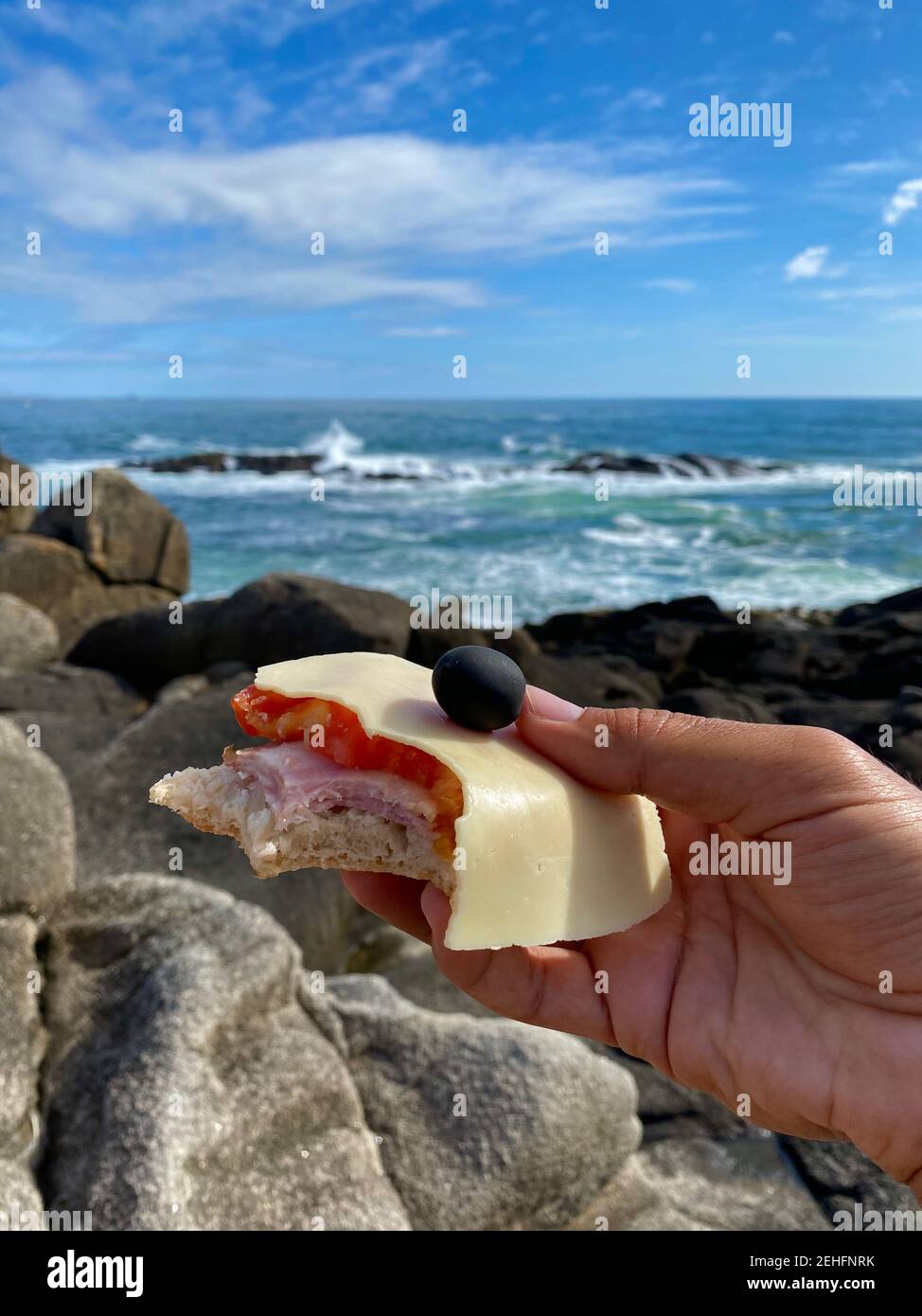 lunch snack with a delicious sandwich overlooking the atlantic ocean Stock Photo