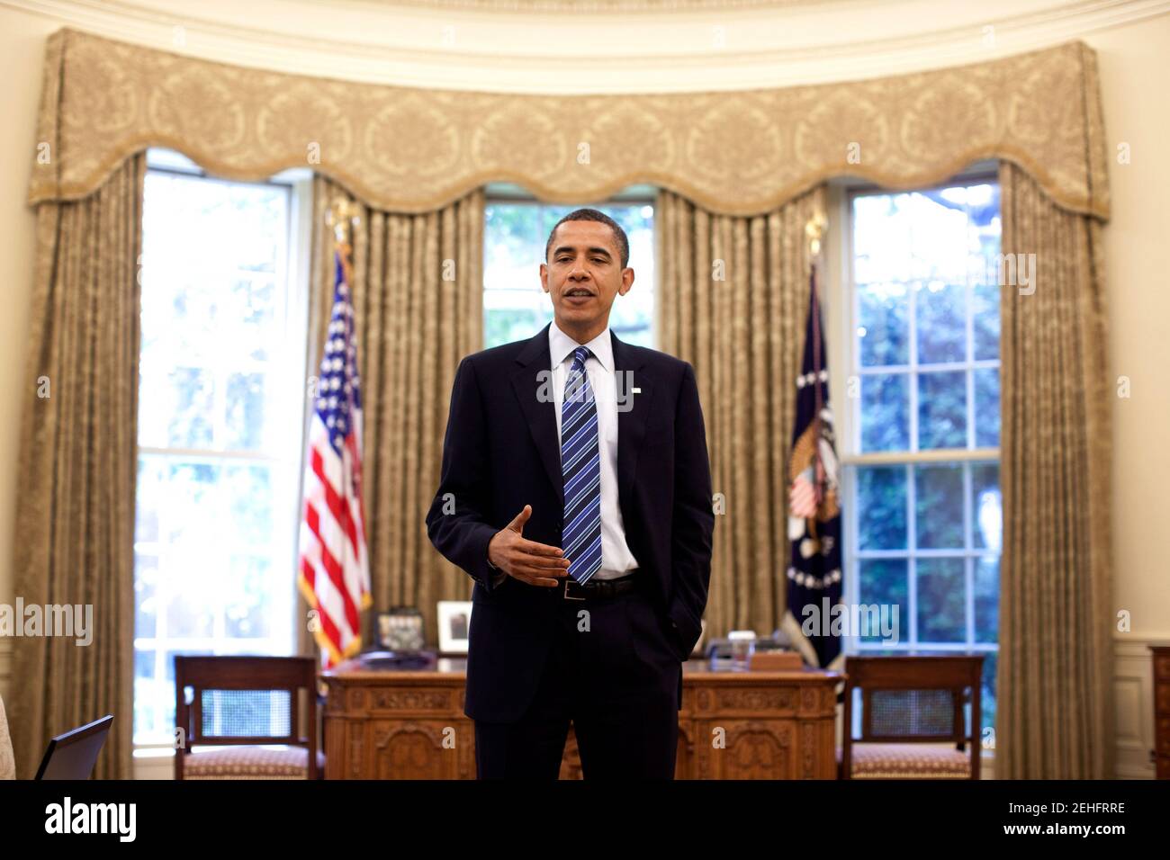 President Barack Obama prepares for a speech in the Oval Office, June 9 ...