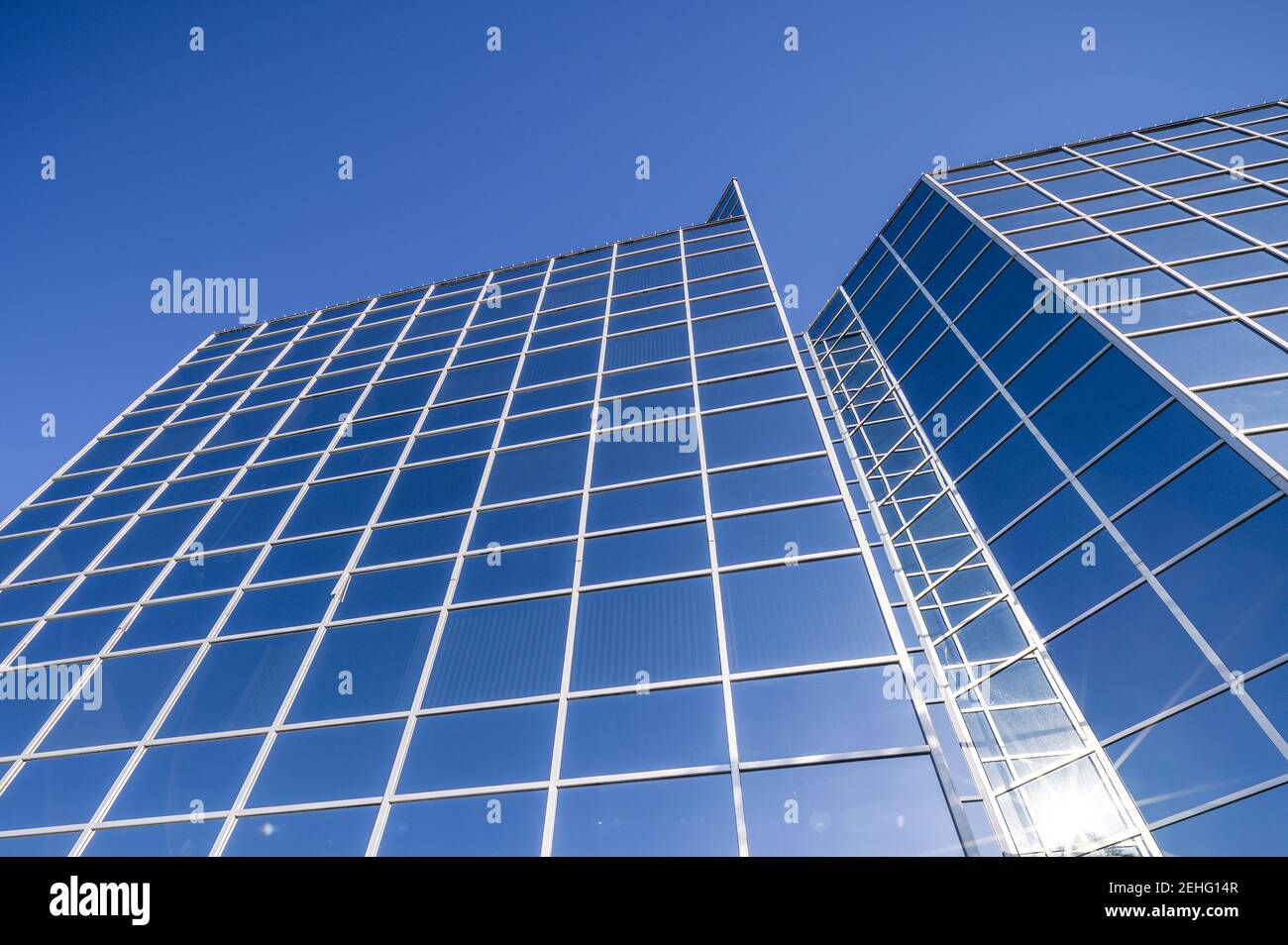 Abstract glass architecture with blue sky Stock Photo - Alamy