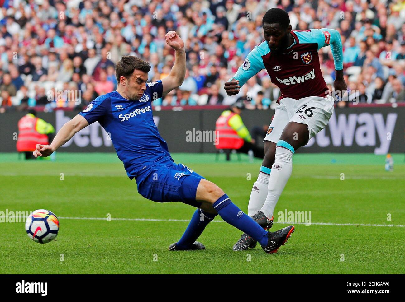 Soccer Football - Premier League - West Ham United vs Everton - London Stadium, London, Britain - May 13, 2018   Everton's Seamus Coleman in action with West Ham United's Arthur Masuaku    REUTERS/Eddie Keogh    EDITORIAL USE ONLY. No use with unauthorized audio, video, data, fixture lists, club/league logos or "live" services. Online in-match use limited to 75 images, no video emulation. No use in betting, games or single club/league/player publications.  Please contact your account representative for further details. Stock Photo