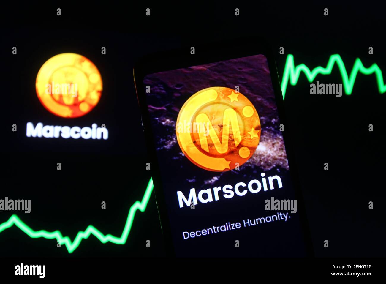 In this photo illustration a Marscoin cryptocurrency logo is seen on a