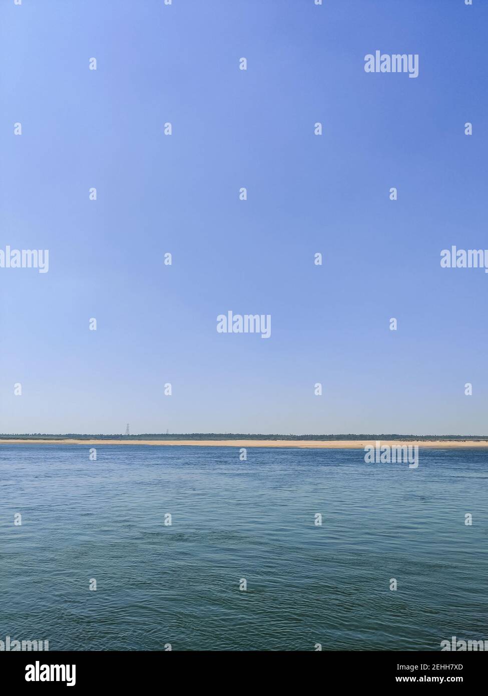 Beautiful scenery calm sea under a clear sky background Stock Photo - Alamy