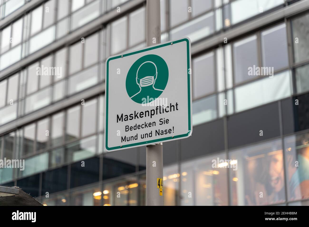 'Maskenpflicht' sign in the city on Prager Strasse due to Covid measures to wear a coronavirus face mask in Dresden, Germany. Stock Photo