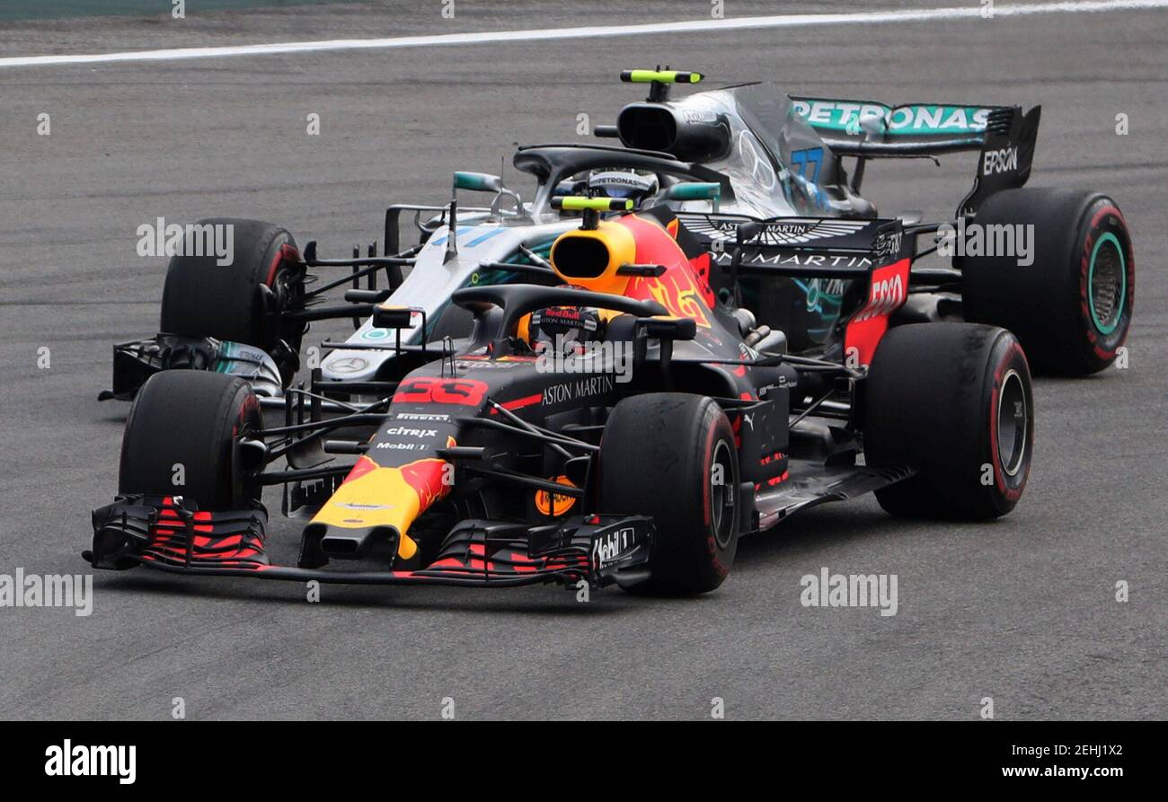 Formula One F1 - Brazilian Grand Prix - Autodromo Jose Carlos Pace, Interlagos, Sao Paulo, Brazil - November 11, 2018  Red Bull's Max Verstappen in action with Mercedes' Valtteri Bottas in action during the race   REUTERS/Paulo Whitaker Stock Photo