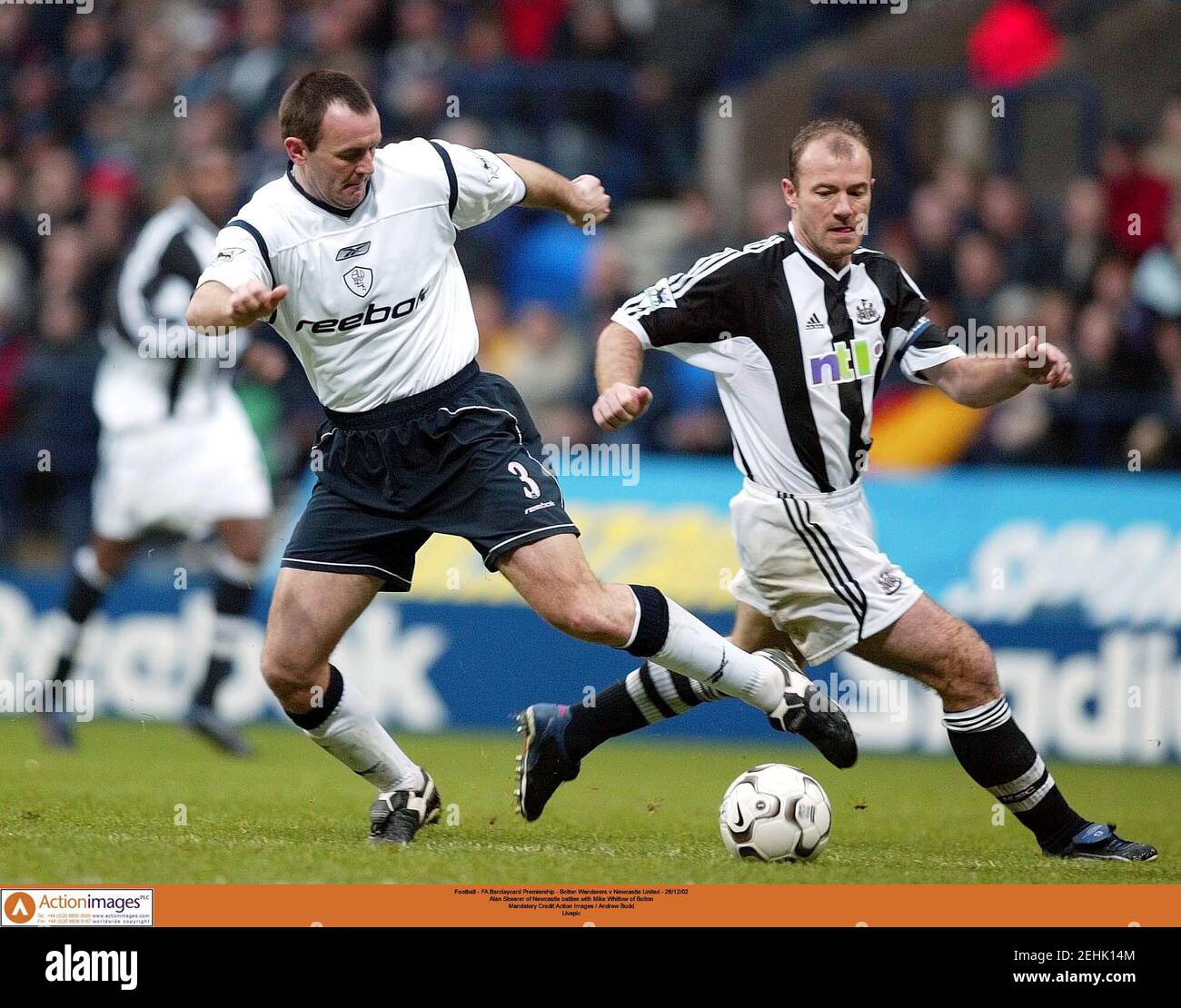 Football - FA Barclaycard Premiership - Bolton Wanderers v Newcastle United - 26/12/02  Alan Shearer of Newcastle battles with Mike Whitlow of Bolton  Mandatory Credit:Action Images / Andrew Budd  Livepic Stock Photo