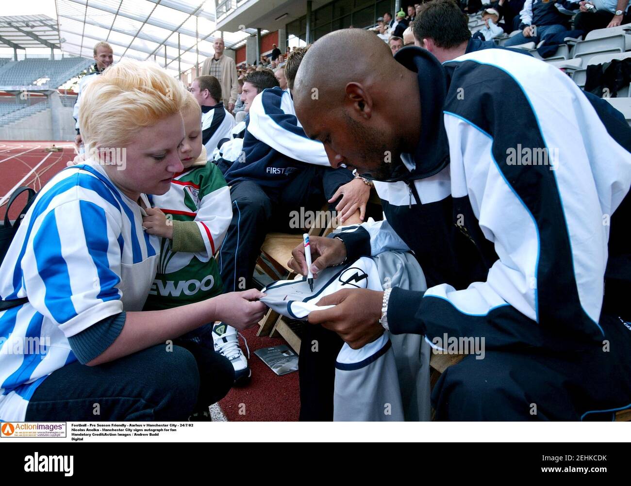 Football - Pre Season Friendly - Aarhus v Manchester City - 24/7/02  Nicolas Anelka - Manchester City signs autograph for fan  Mandatory Credit:Action Images / Andrew Budd  Digital Stock Photo