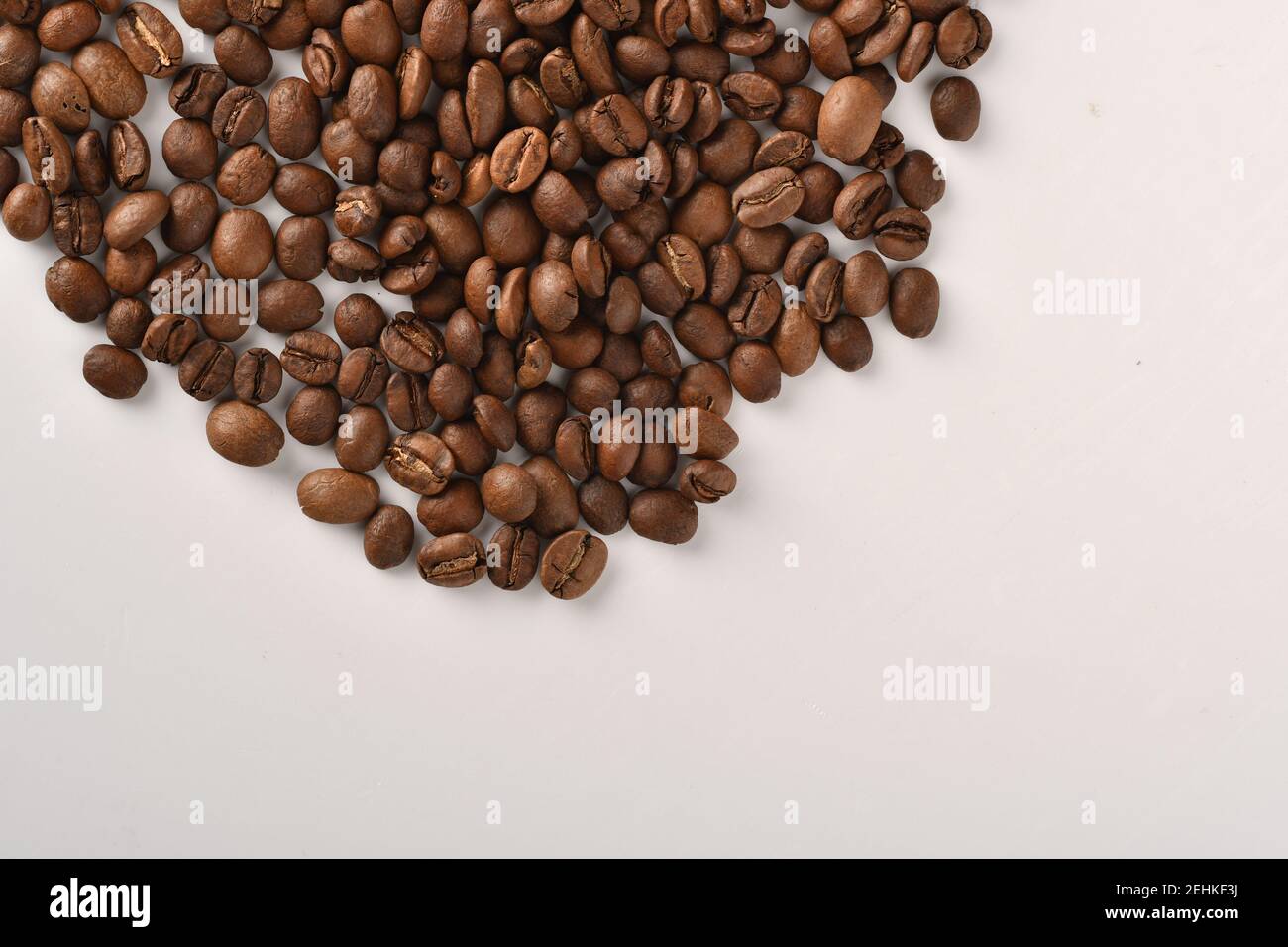 Coffee beans isolated on white background with copy space for text ...