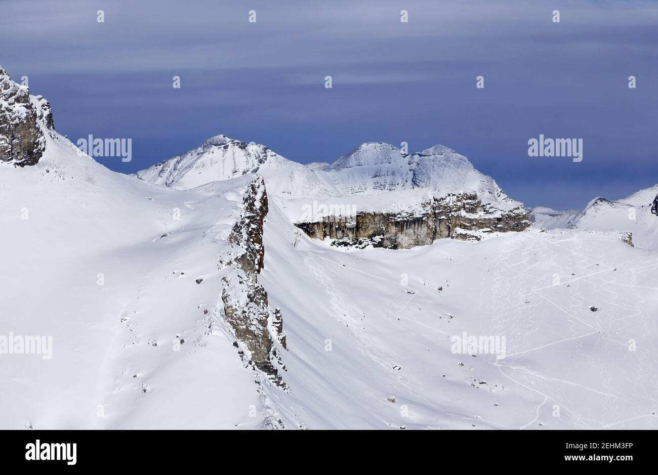 Snowcapped Mountain Peaks and Alpine Valley Aerial Landscape View.  Winter Rock Climbing in Banff National Park, Canadian Rockies Stock Photo