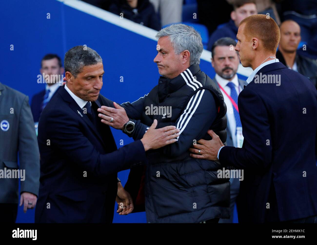 Soccer Football - Premier League - Brighton & Hove Albion v Manchester United - The American Express Community Stadium, Brighton, Britain - May 4, 2018   Manchester United manager Jose Mourinho and Brighton manager Chris Hughton before the match as Steve Sidwell looks on   REUTERS/Eddie Keogh    EDITORIAL USE ONLY. No use with unauthorized audio, video, data, fixture lists, club/league logos or 'live' services. Online in-match use limited to 75 images, no video emulation. No use in betting, games or single club/league/player publications.  Please contact your account representative for further Stock Photo