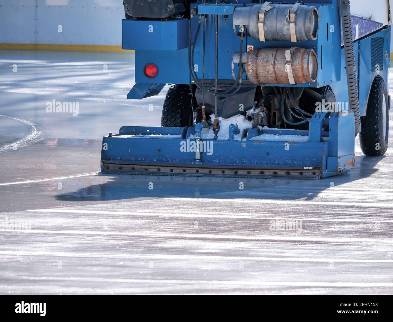 Ice resurfacer smoothing and polishing the surface of the ice rink Stock Photo Alamy