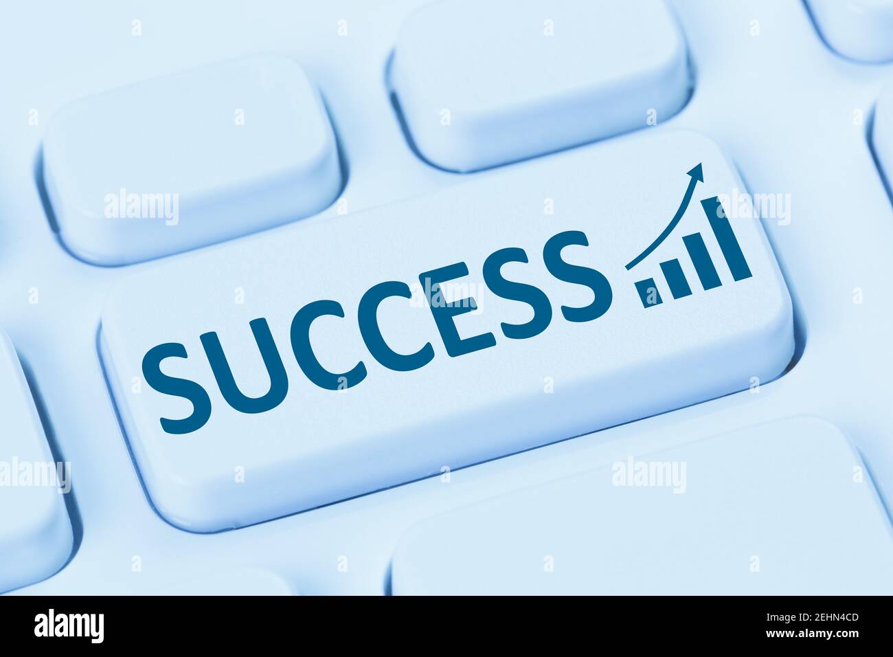 Success successful business concept work growth strategy internet blue symbol computer keyboard Stock Photo