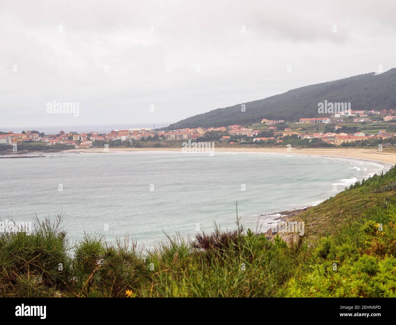 First sight of Finisterre and the Shrimp Beach (Praiade Langosteira) on an overcast day in autumn - Sardineiro, Galicia, Spain Stock Photo