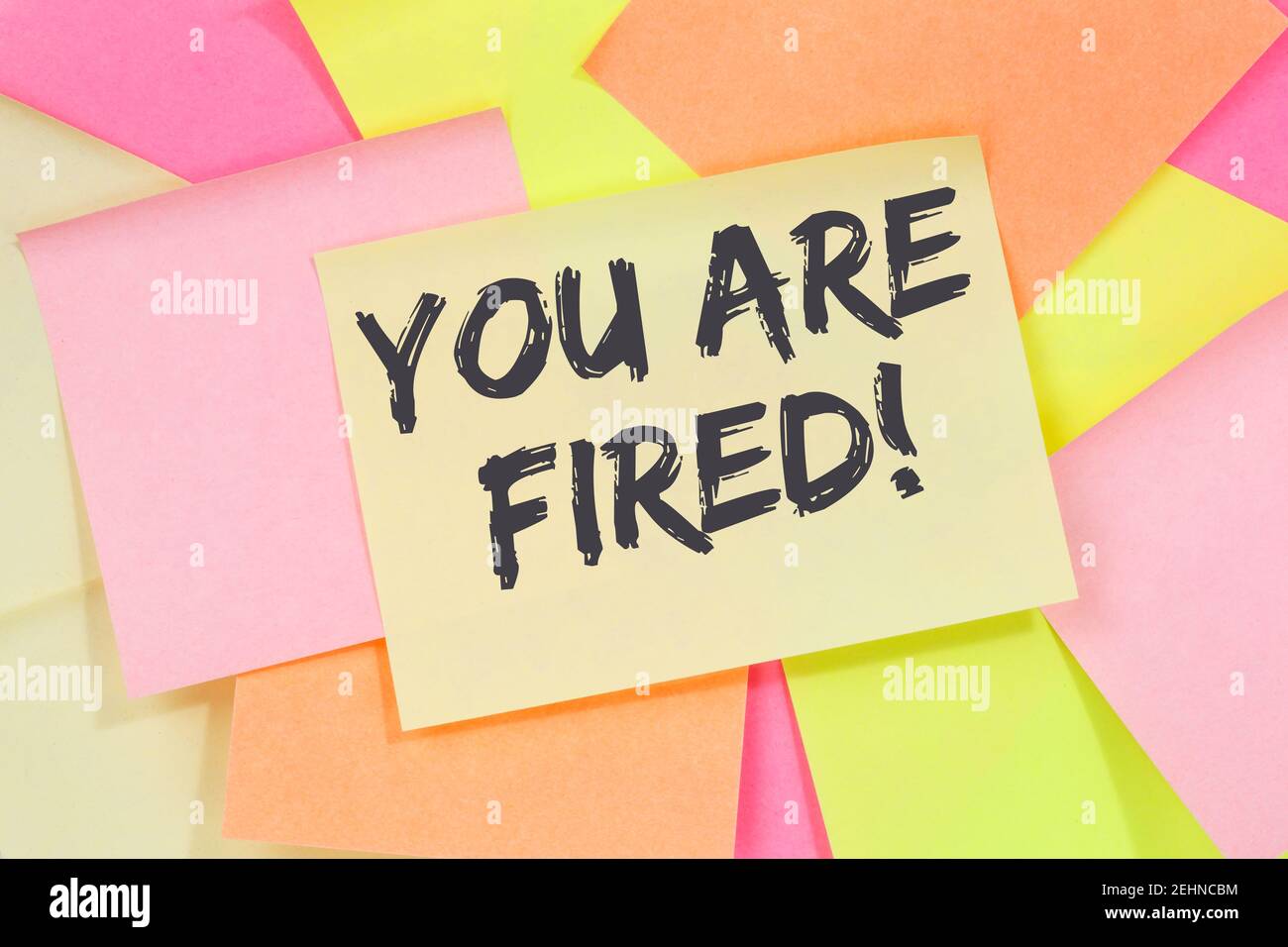 You are fired employee losing jobs, job working unemployed business concept note paper notepaper Stock Photo