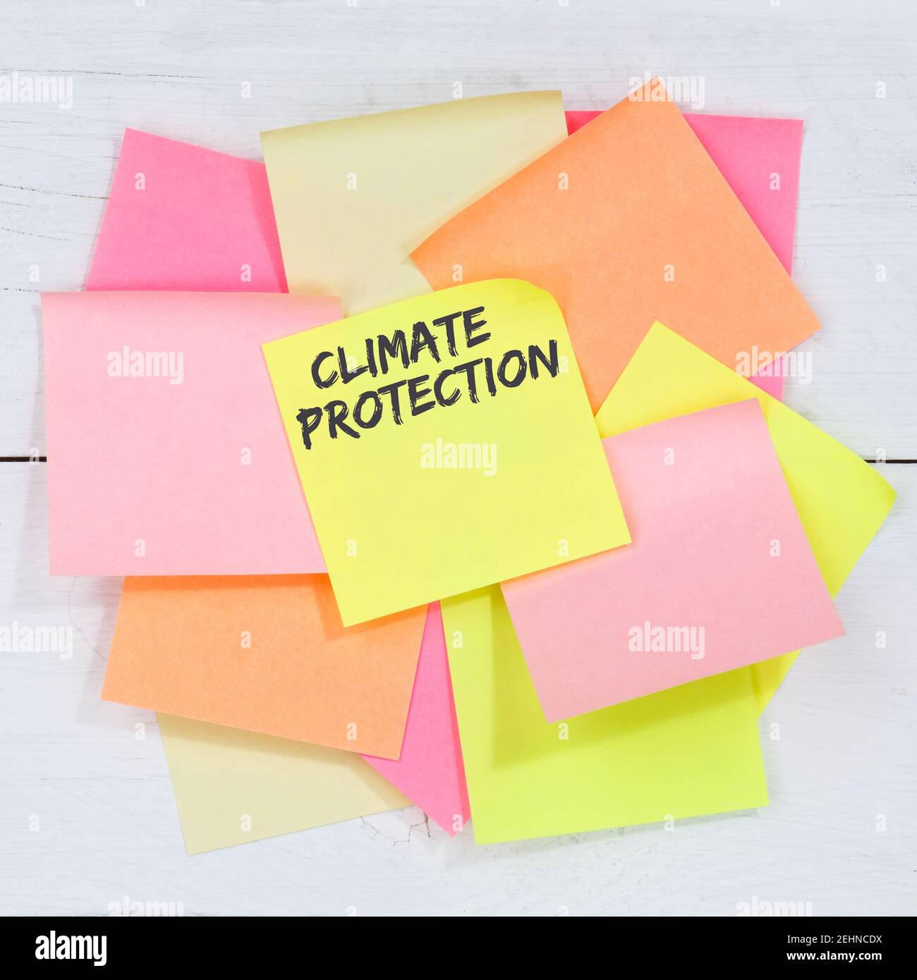 Climate protection change environment eco friendly nature conservation desk note paper notes Stock Photo