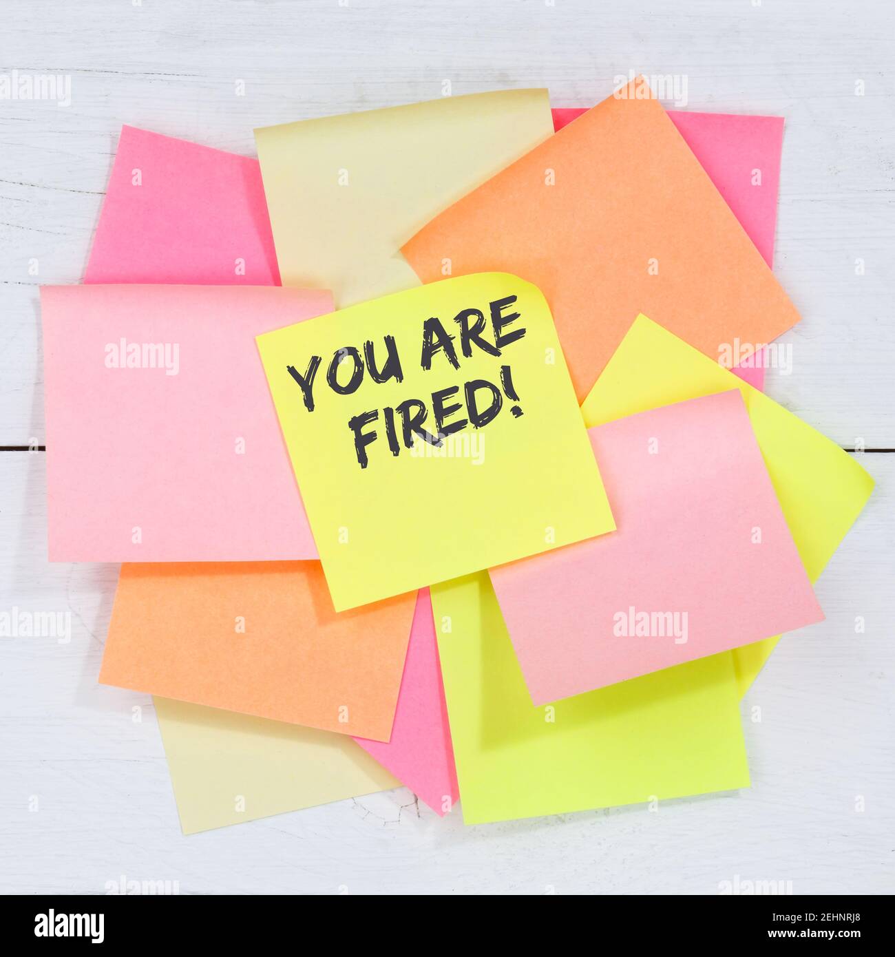 You are fired employee losing jobs, job working unemployed business concept desk note paper notepaper Stock Photo