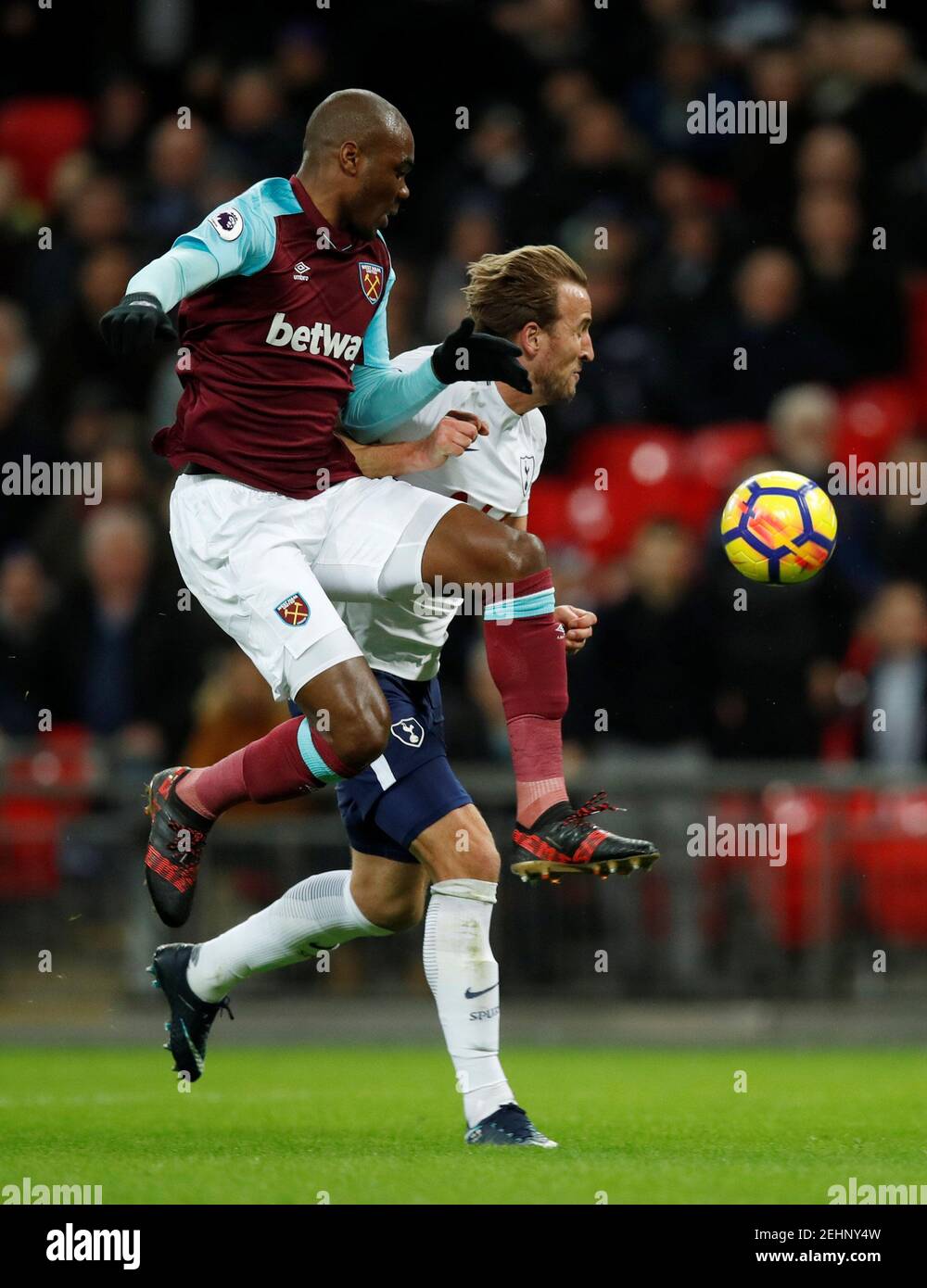 Soccer Football - Premier League - Tottenham Hotspur vs West Ham United - Wembley Stadium, London, Britain - January 4, 2018   Tottenham's Harry Kane in action with West Ham United's Angelo Ogbonna    REUTERS/Eddie Keogh    EDITORIAL USE ONLY. No use with unauthorized audio, video, data, fixture lists, club/league logos or 'live' services. Online in-match use limited to 75 images, no video emulation. No use in betting, games or single club/league/player publications.  Please contact your account representative for further details. Stock Photo