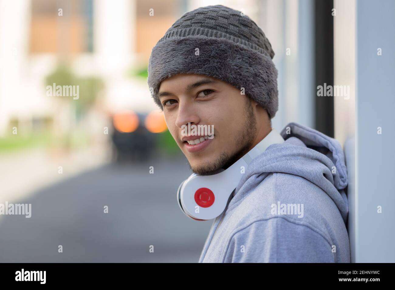 Young latin man copyspace copy space runner sports training with headphones outdoor Stock Photo