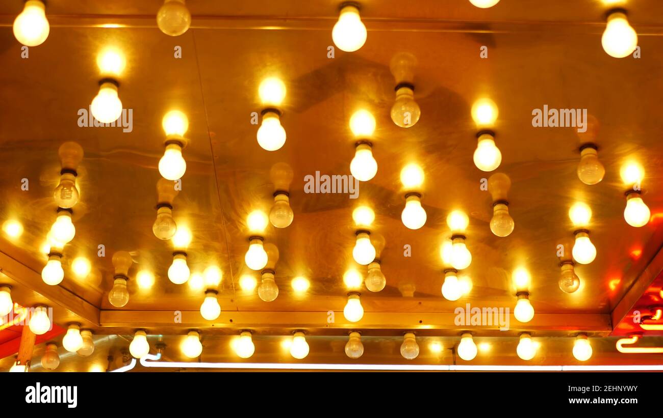 Old fasioned electric lamps blinking and glowing at night. Abstract