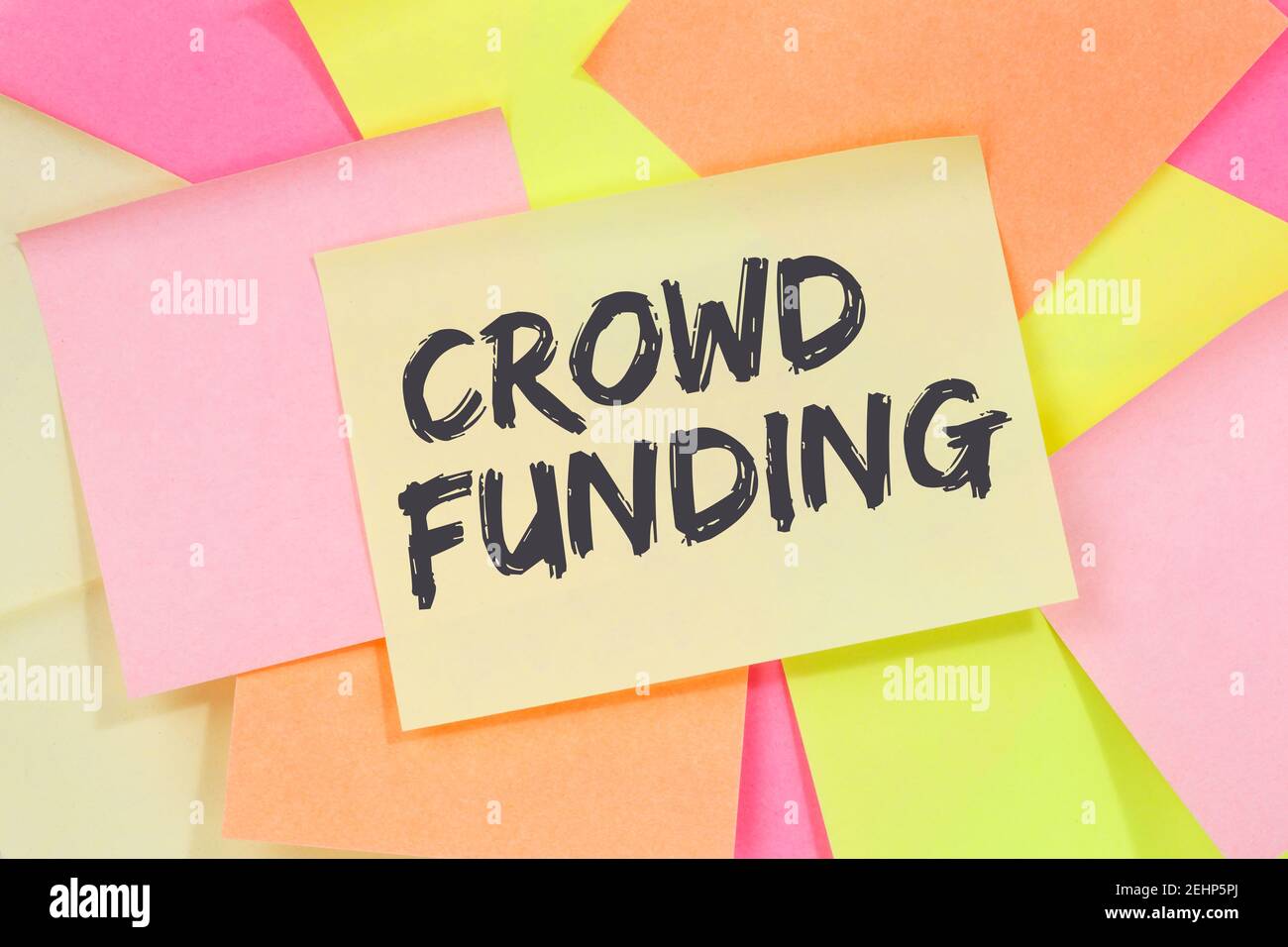 Crowd funding crowdfunding collecting money online investment internet business concept note paper notepaper Stock Photo