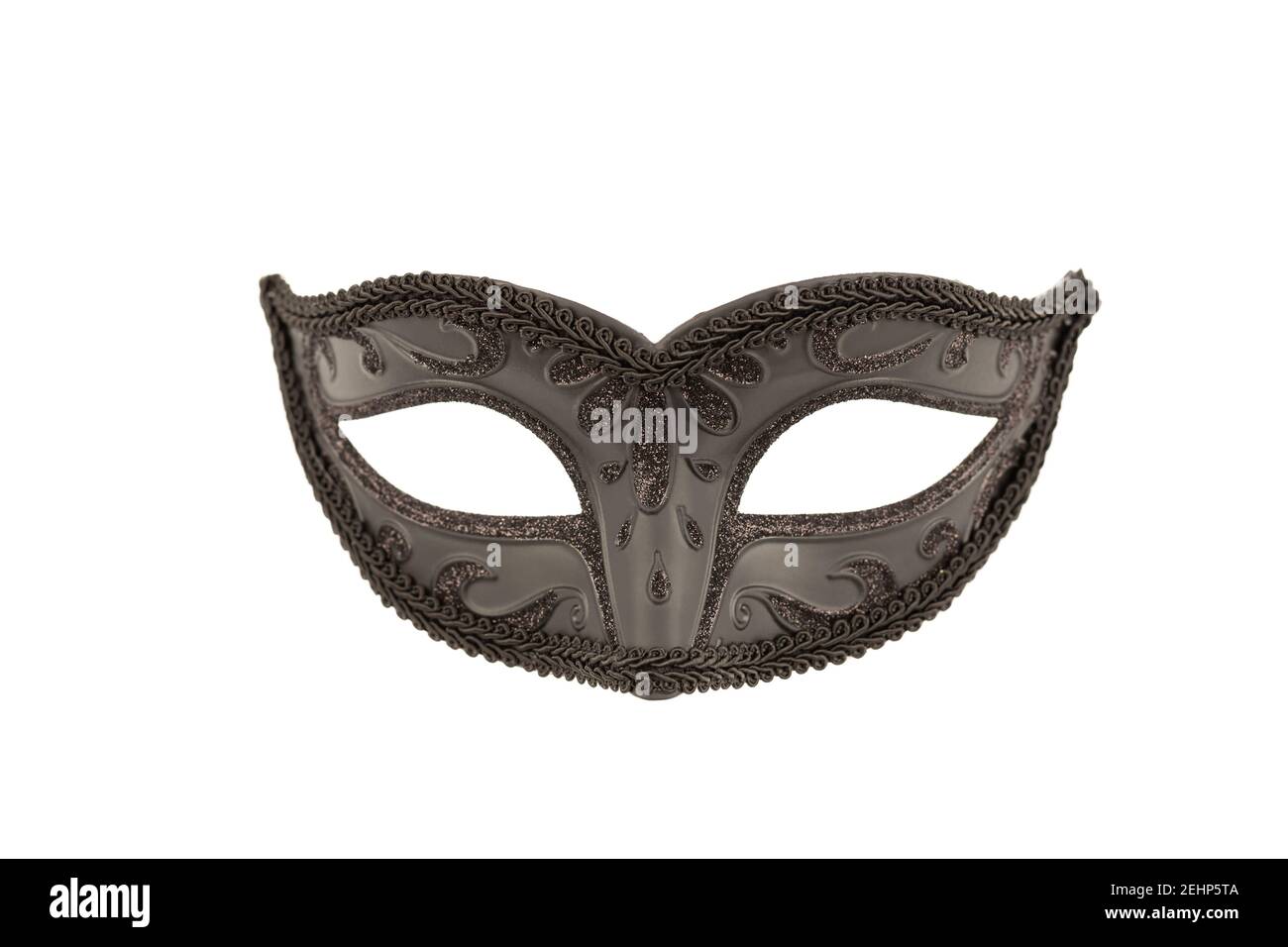 Black carnival mask with ornament isolated on a white background. Stock Photo