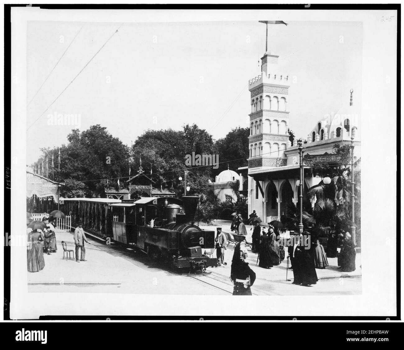 Passenger train in front of Pavilion of Algeria on L'Esplanade des Invalides, Paris Exposition, 1889 Stock Photo