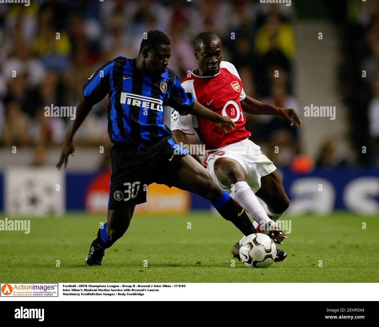 Football - UEFA Champions League - Group B - Arsenal v Inter Milan -  17/9/03 Inter Milan's Obafemi Martins tussles with Arsenal's Lauren  Mandatory Credit:Action Images / Andy Couldridge Stock Photo - Alamy