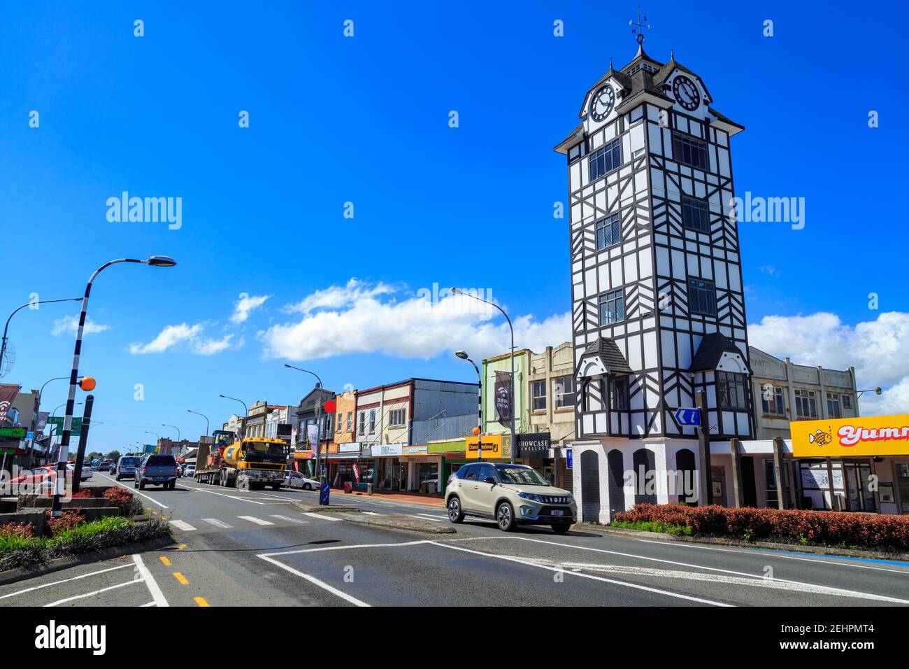 Stratford, New Zealand. To the right is an Elizabethan-style glockenspiel clock tower, one of the town's many references to Shakespeare Stock Photo