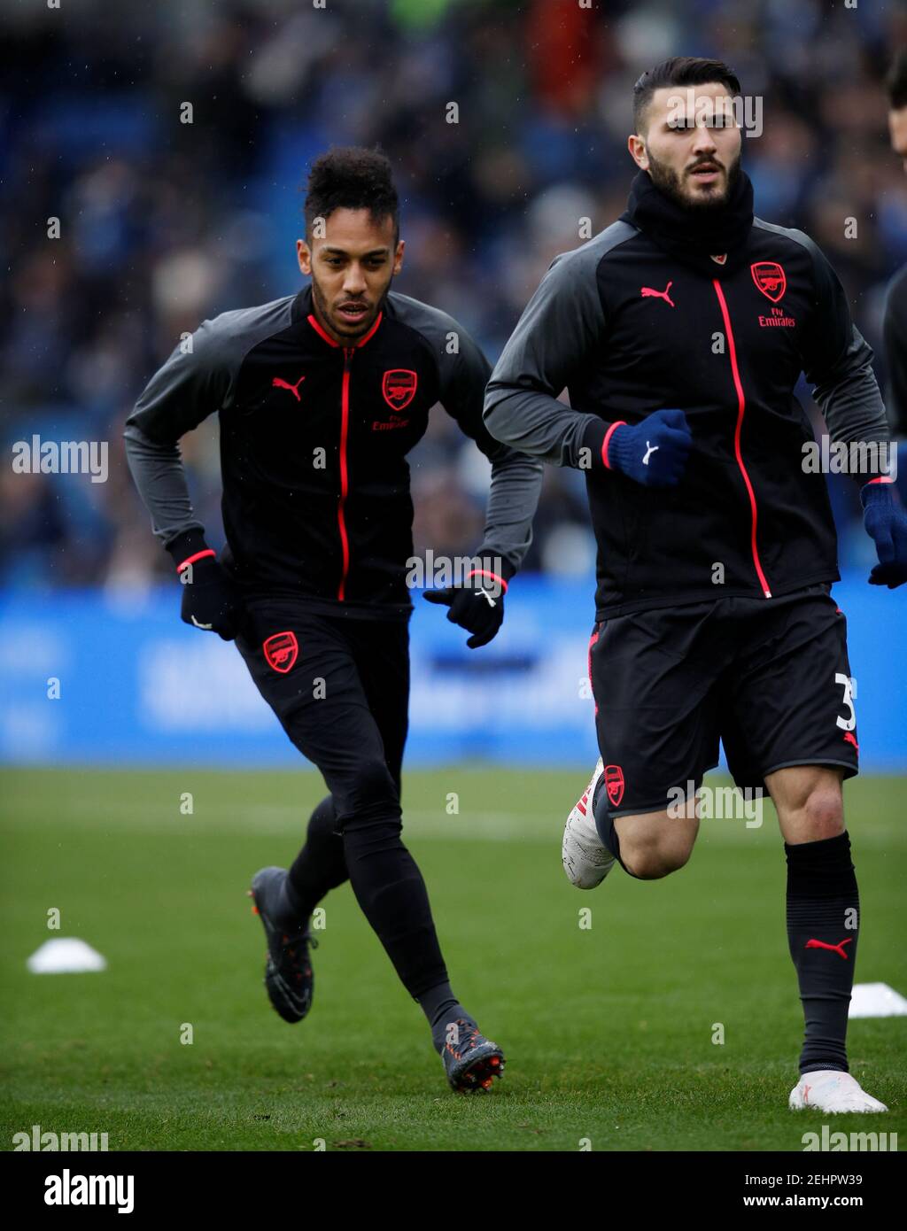 Soccer Football - Premier League - Brighton & Hove Albion vs Arsenal - The American Express Community Stadium, Brighton, Britain - March 4, 2018   Arsenal's Pierre-Emerick Aubameyang and Sead Kolasinac warm up   REUTERS/Eddie Keogh    EDITORIAL USE ONLY. No use with unauthorized audio, video, data, fixture lists, club/league logos or 'live' services. Online in-match use limited to 75 images, no video emulation. No use in betting, games or single club/league/player publications.  Please contact your account representative for further details. Stock Photo