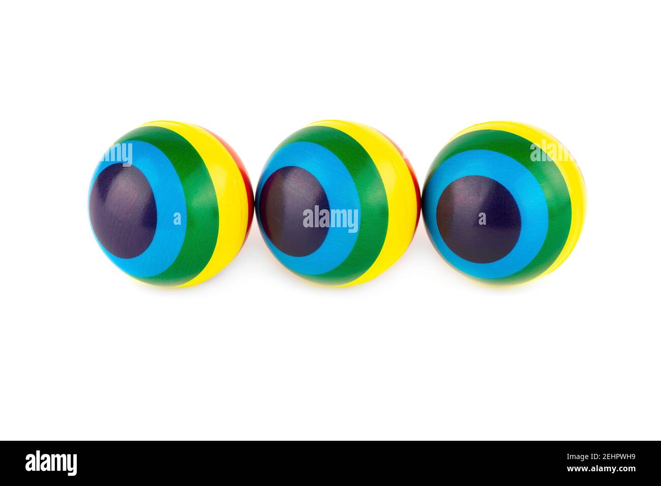 Three colorful striped rubber balls isolated on white background Stock