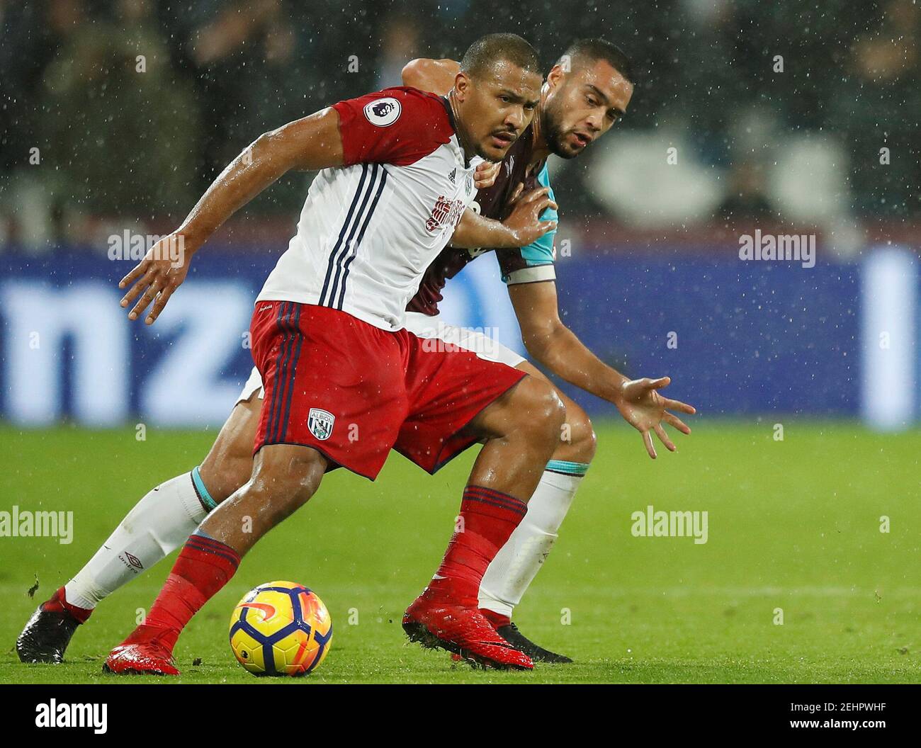 Soccer Football - Premier League - West Ham United vs West Bromwich Albion - London Stadium, London, Britain - January 2, 2018   West Bromwich Albion's Salomon Rondon in action with West Ham United's Winston Reid    REUTERS/Eddie Keogh    EDITORIAL USE ONLY. No use with unauthorized audio, video, data, fixture lists, club/league logos or 'live' services. Online in-match use limited to 75 images, no video emulation. No use in betting, games or single club/league/player publications.  Please contact your account representative for further details. Stock Photo