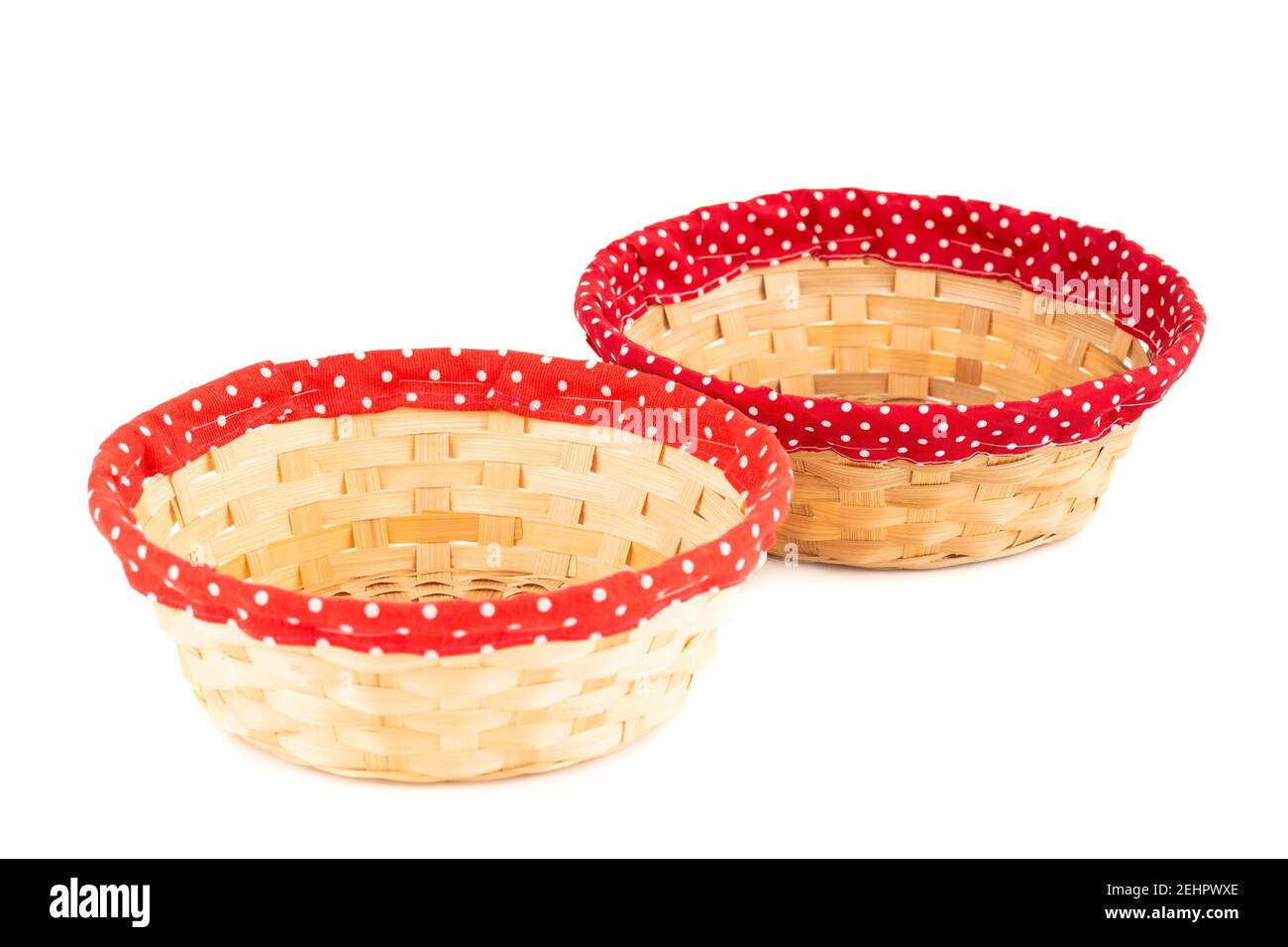 Two empty wicker baskets isolated on white background. Stock Photo