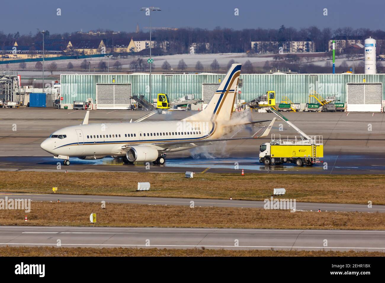 Stuttgart, Germany - January 15, 2021: De-icing of a Gainjet Ireland Boeing 737-700(BBJ) airplane at Stuttgart Airport (STR) in Germany. Stock Photo