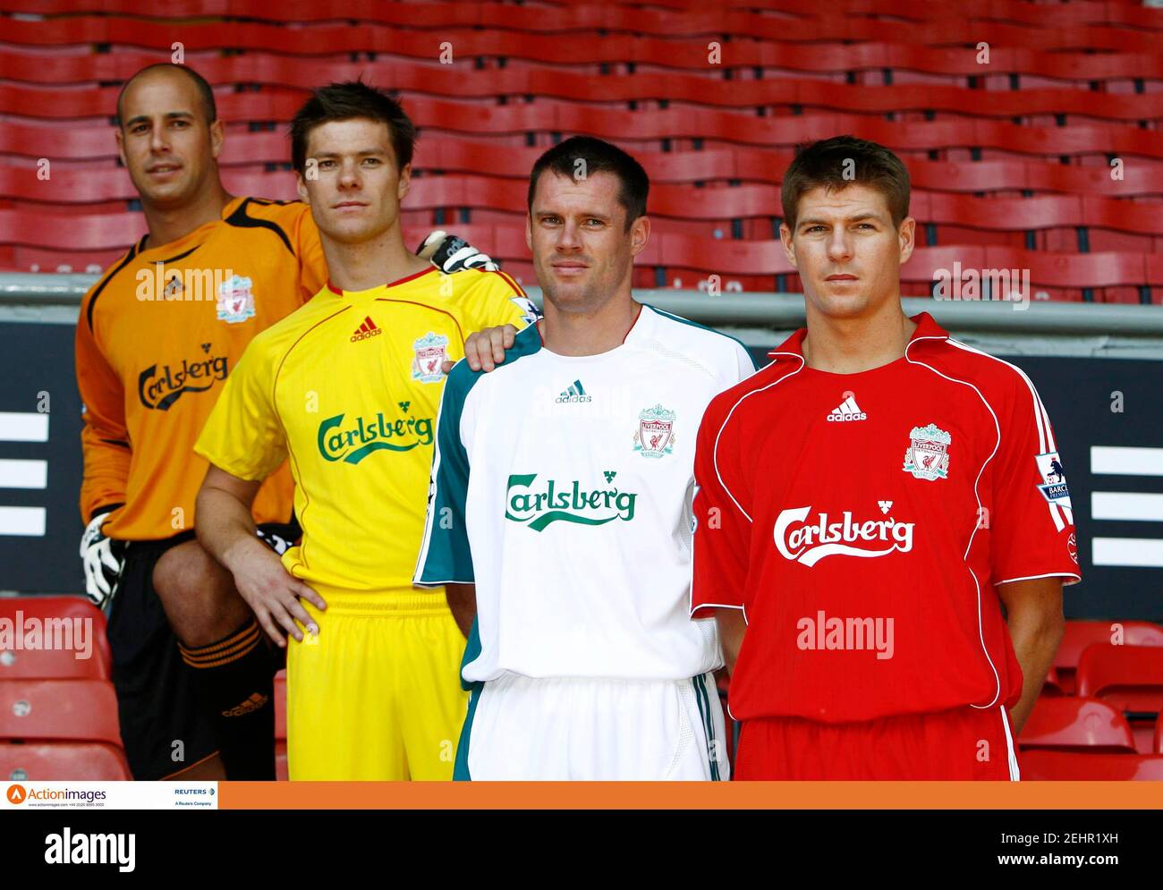 Football - Liverpool - adidas Official Kit Launch 2006/07 - Anfield - 24/7/ 06 Liverpool's Steven Gerrard in the new Adidas home kit, Xabi Alonso in  the away kit, Jamie Carragher in the