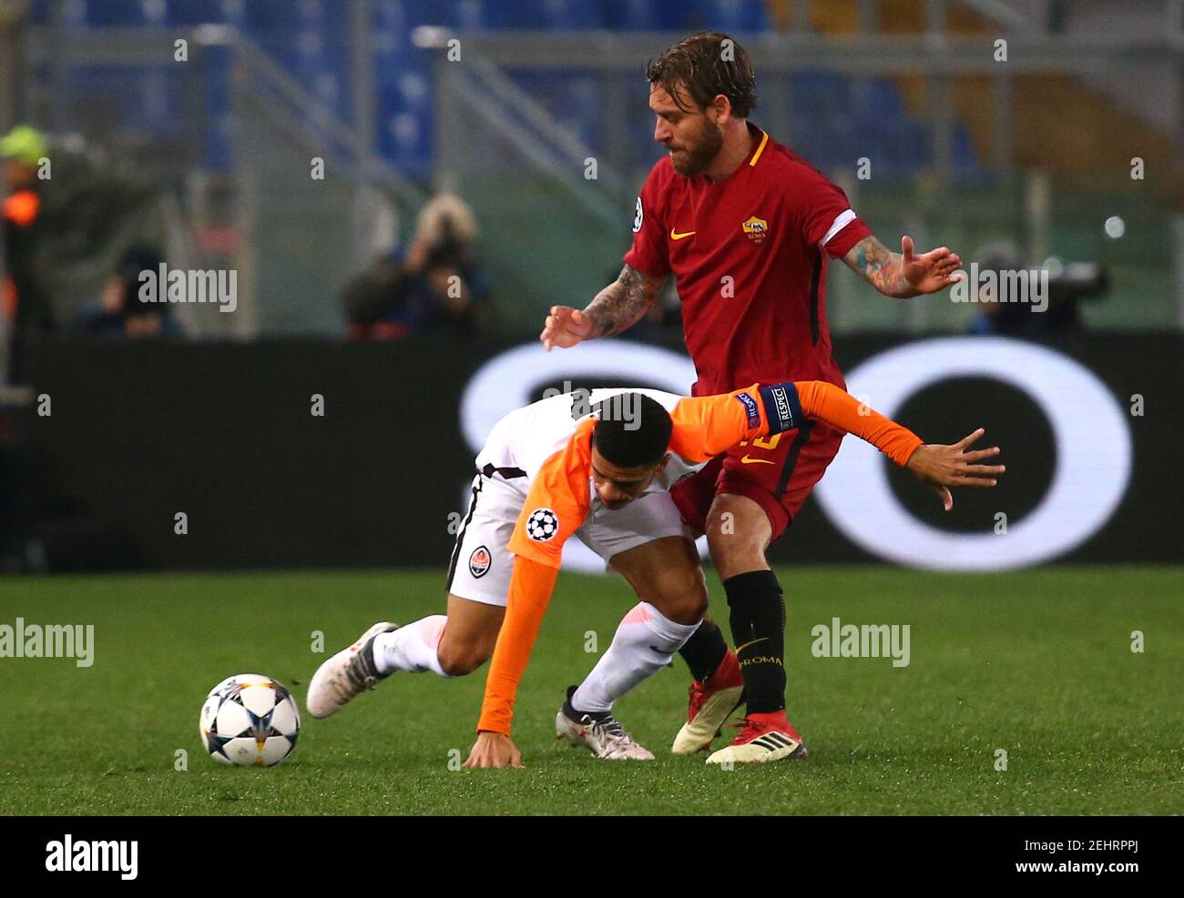 Soccer Football - Champions League Round of 16 Second Leg - AS Roma vs Shakhtar Donetsk - Stadio Olimpico, Rome, Italy - March 13, 2018   Shakhtar Donetsk's Taison in action with Roma's Daniele De Rossi   REUTERS/Alessandro Bianchi Stock Photo