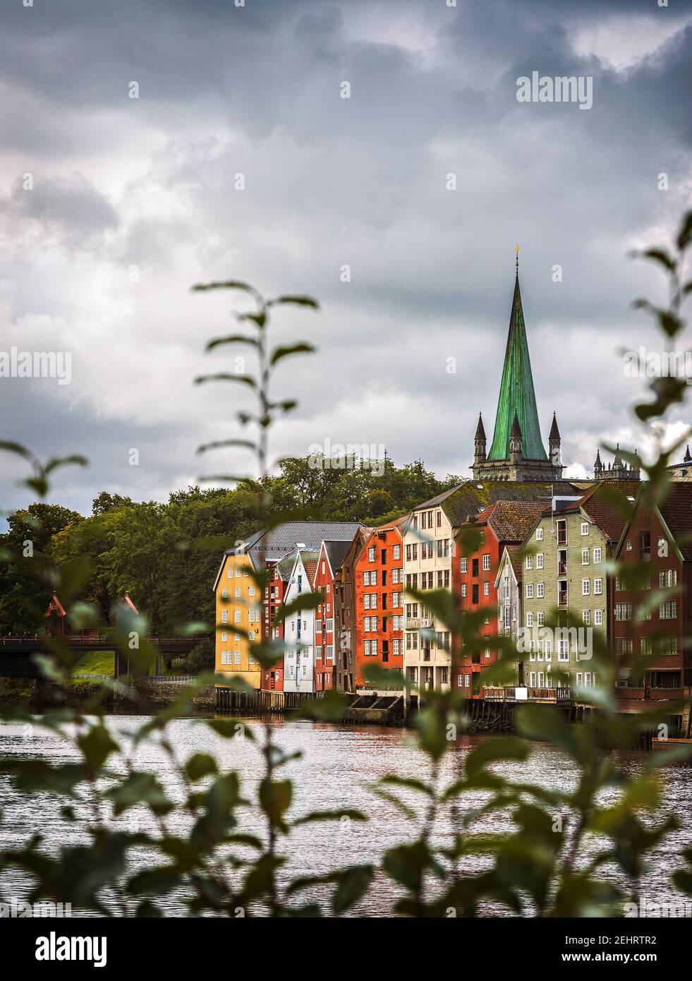 Colourful buildings along the river nidelva, in Trondheim, Norway. Stock Photo