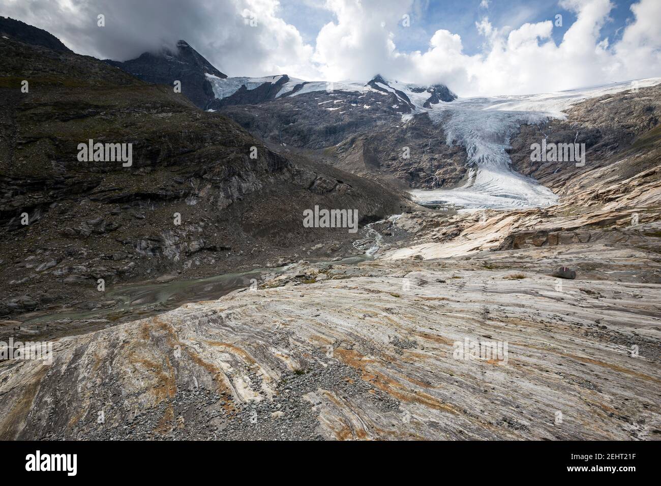 Rocks smoothed by glacier. Tauerntal alpine valley. Venediger mountain group. Osttirol. Austrian Alps. Europe Stock Photo