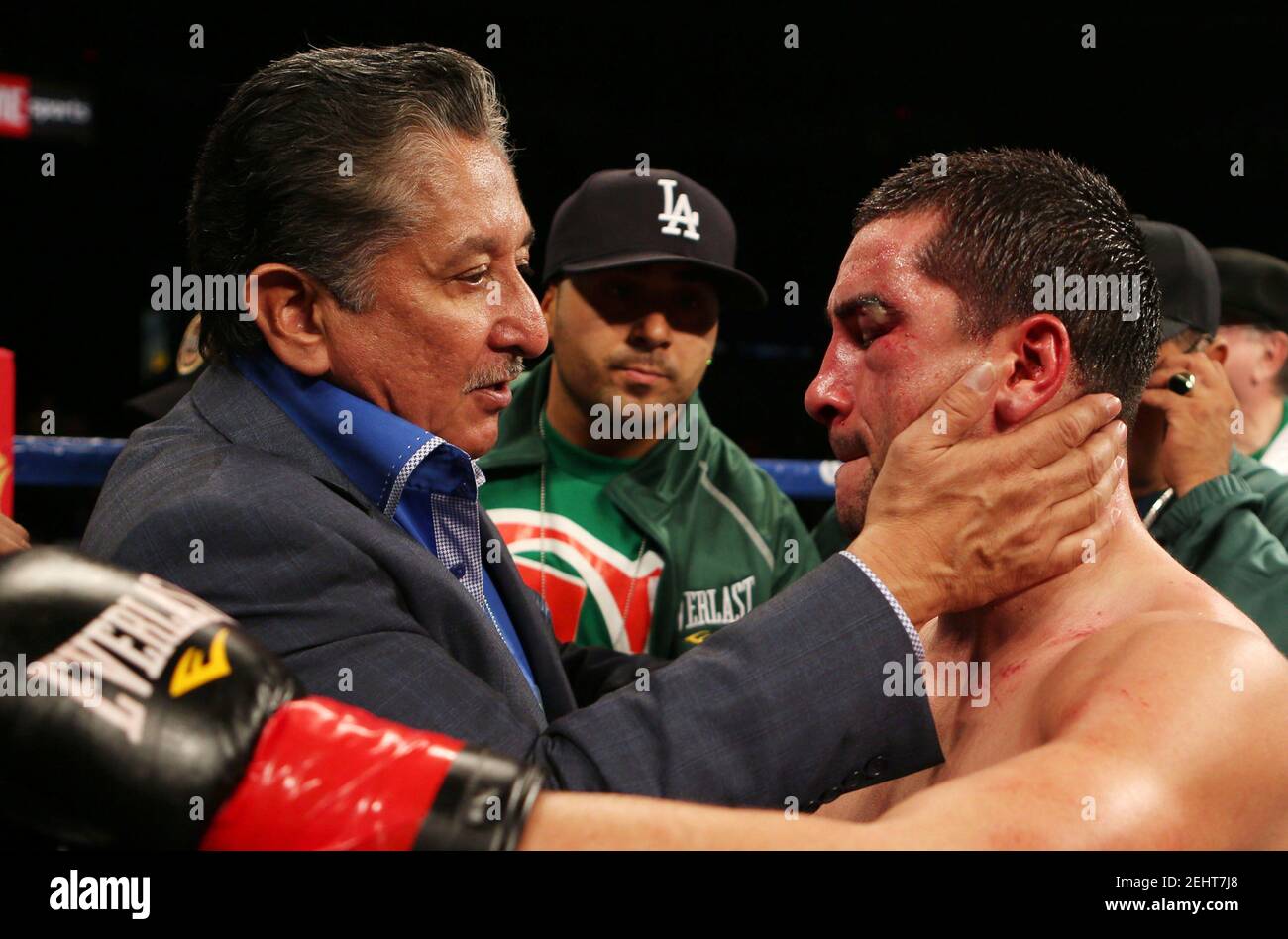 Boxing - Amir Khan v Carlos Molina WBC Silver Super Lightweight Title  - Los Angeles Memorial Sports Arena, Los Angeles, California, United States of America - 15/12/12  Carlos Molina dejected with family after fight  Mandatory Credit: Action Images / Lee Smith Stock Photo