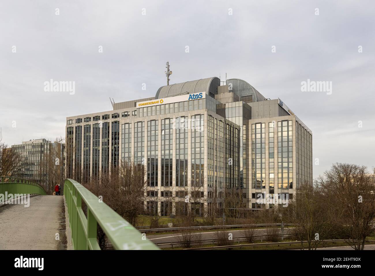 Tall office building located in business district near good traffic