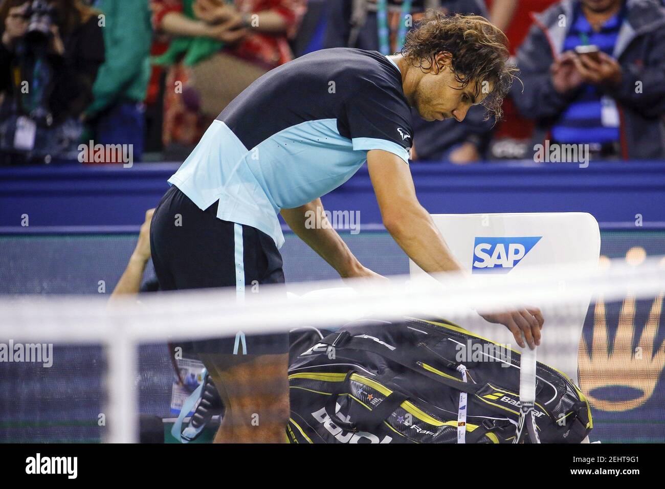 Rafael Nadal of Spain prepares to leave the court after losing to Jo-Wilfried Tsonga of France in their men's singles semi-final match at the Shanghai Masters tennis tournament in Shanghai, China, October 17, 2015. REUTERS/Damir Sagolj   Picture Supplied by Action Images Stock Photo